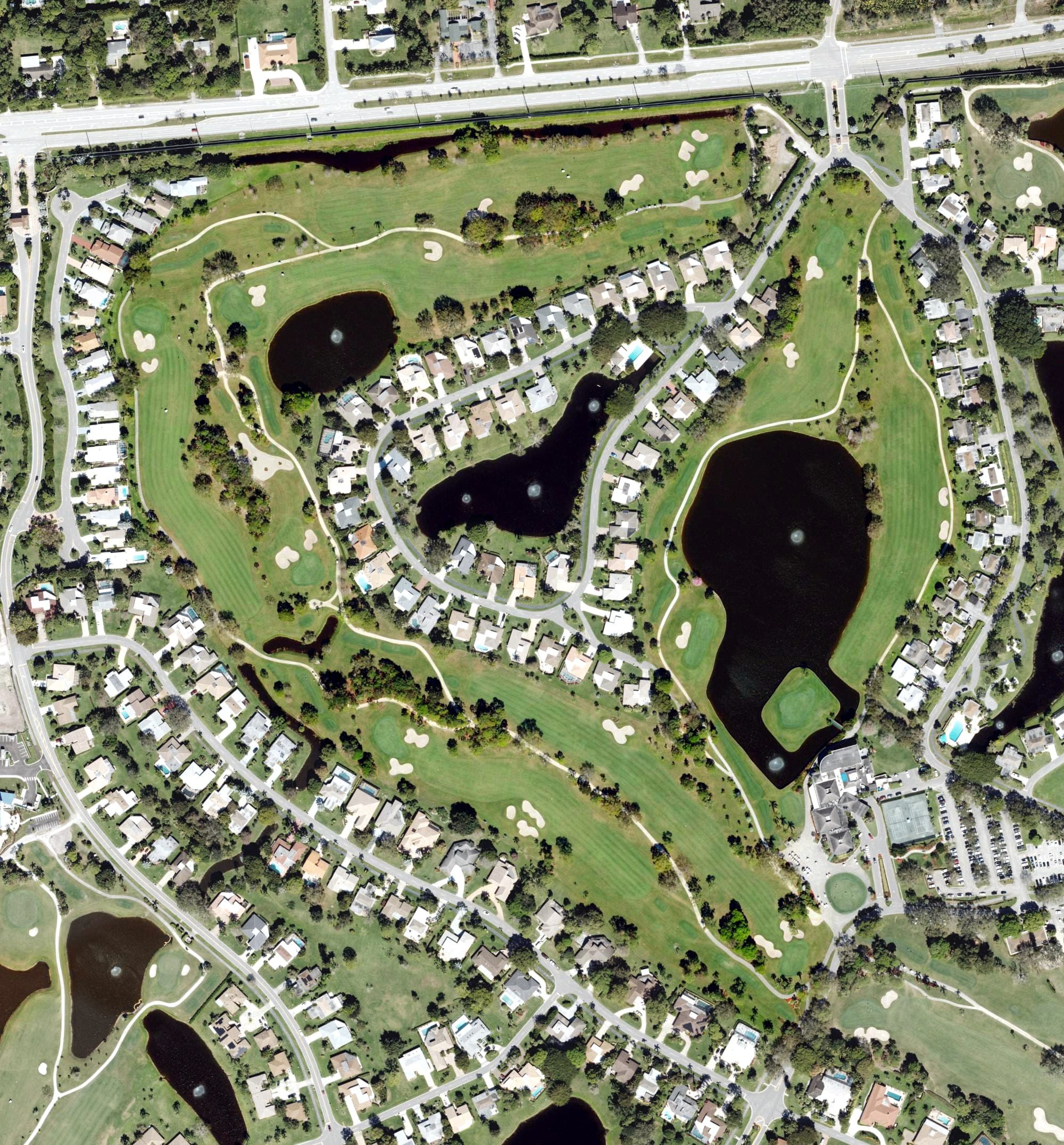 Aerial view of Eastpointe Country Club, FL, with its hole routing marked