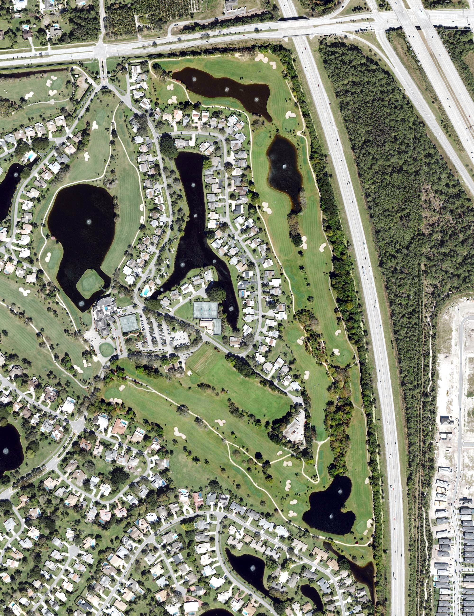 Aerial view of Eastpointe Country Club, FL, with its hole routing marked