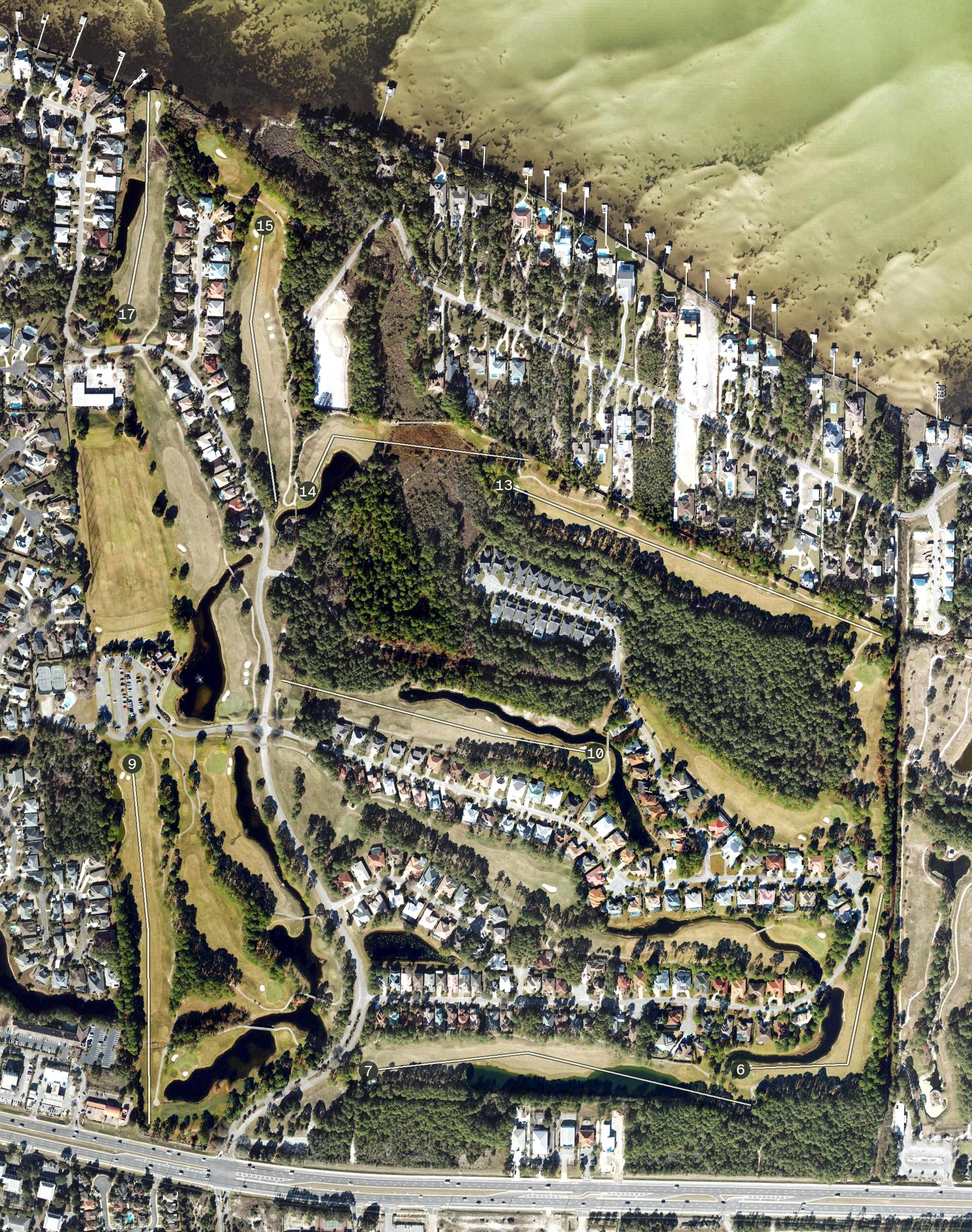 Aerial view of Emerald Bay Golf Course New Eigth Green, FL, with its hole routing marked