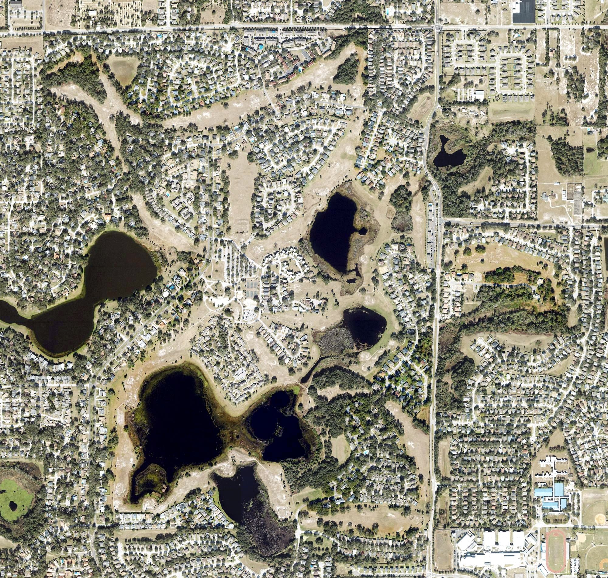 Aerial view of Errol Estate Golf & Country Club, FL, with its hole routing marked