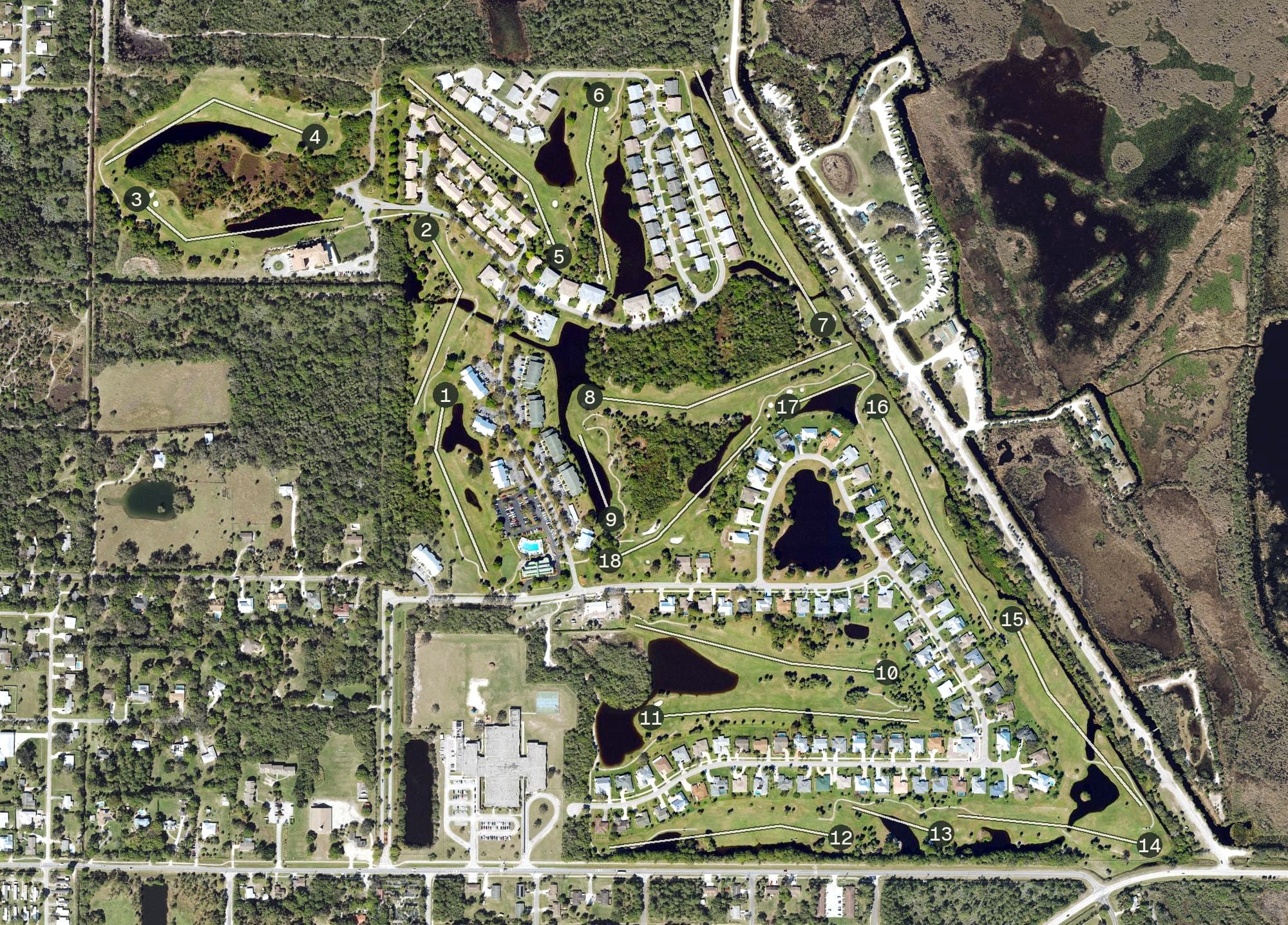 Aerial view of Gator Trace Golf & Country Club, FL, with its hole routing marked