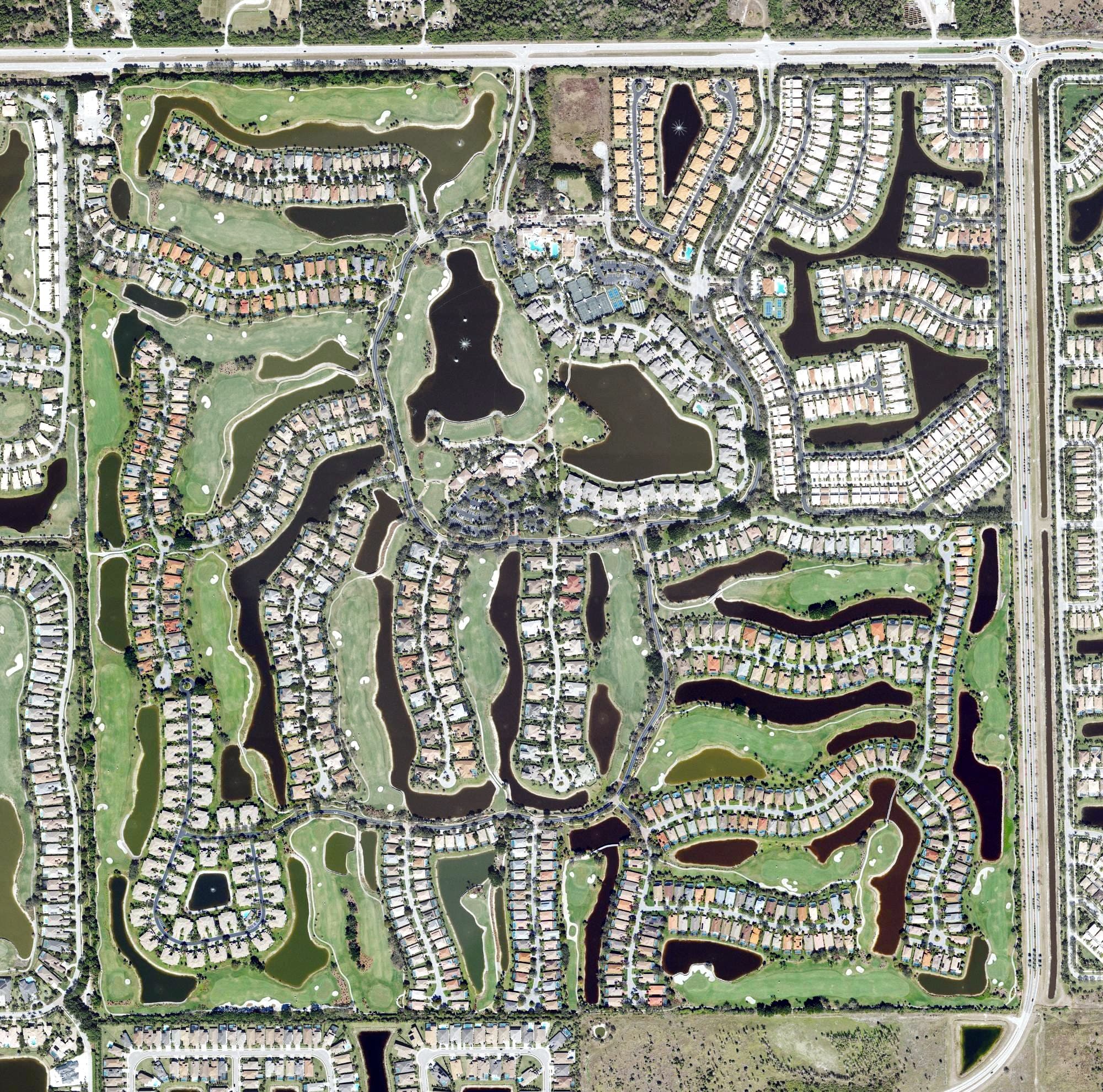 Aerial view of Golf Club at Palmira, FL, with its hole routing marked