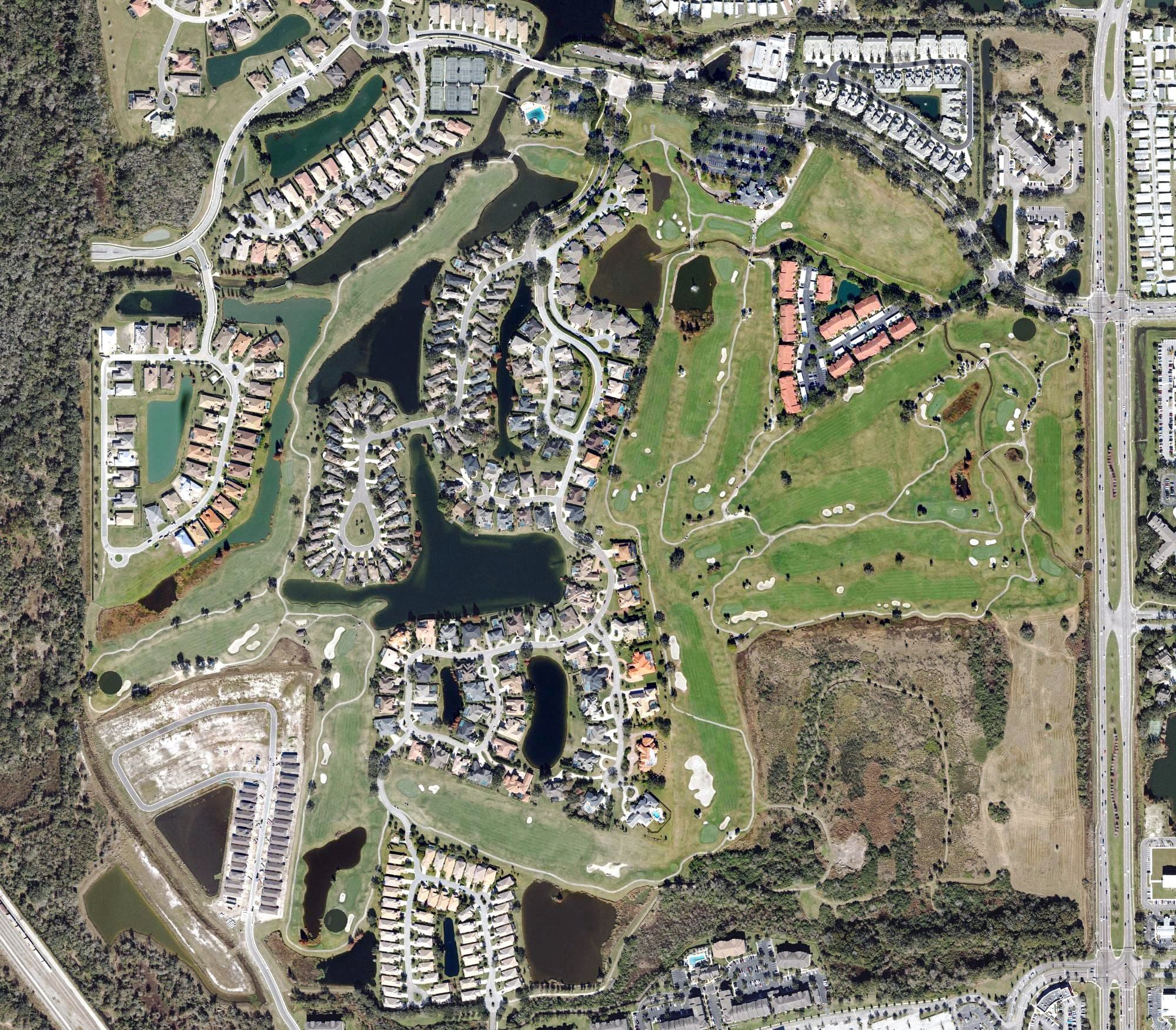 Aerial view of Grasslands Golf & Country Club, FL, with its hole routing marked
