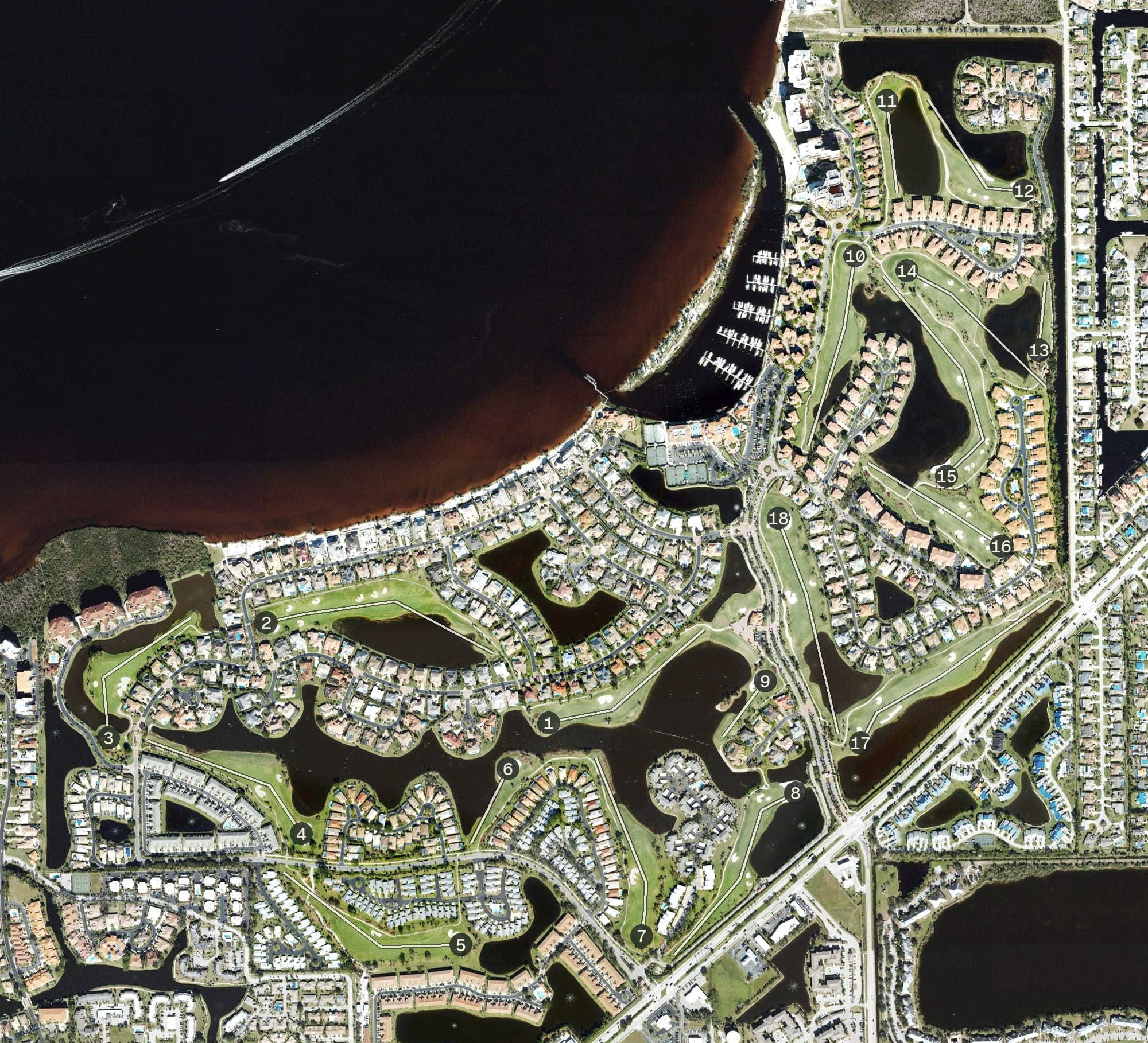 Aerial view of Gulf Harbour Yacht & Country Club, FL, with its hole routing marked