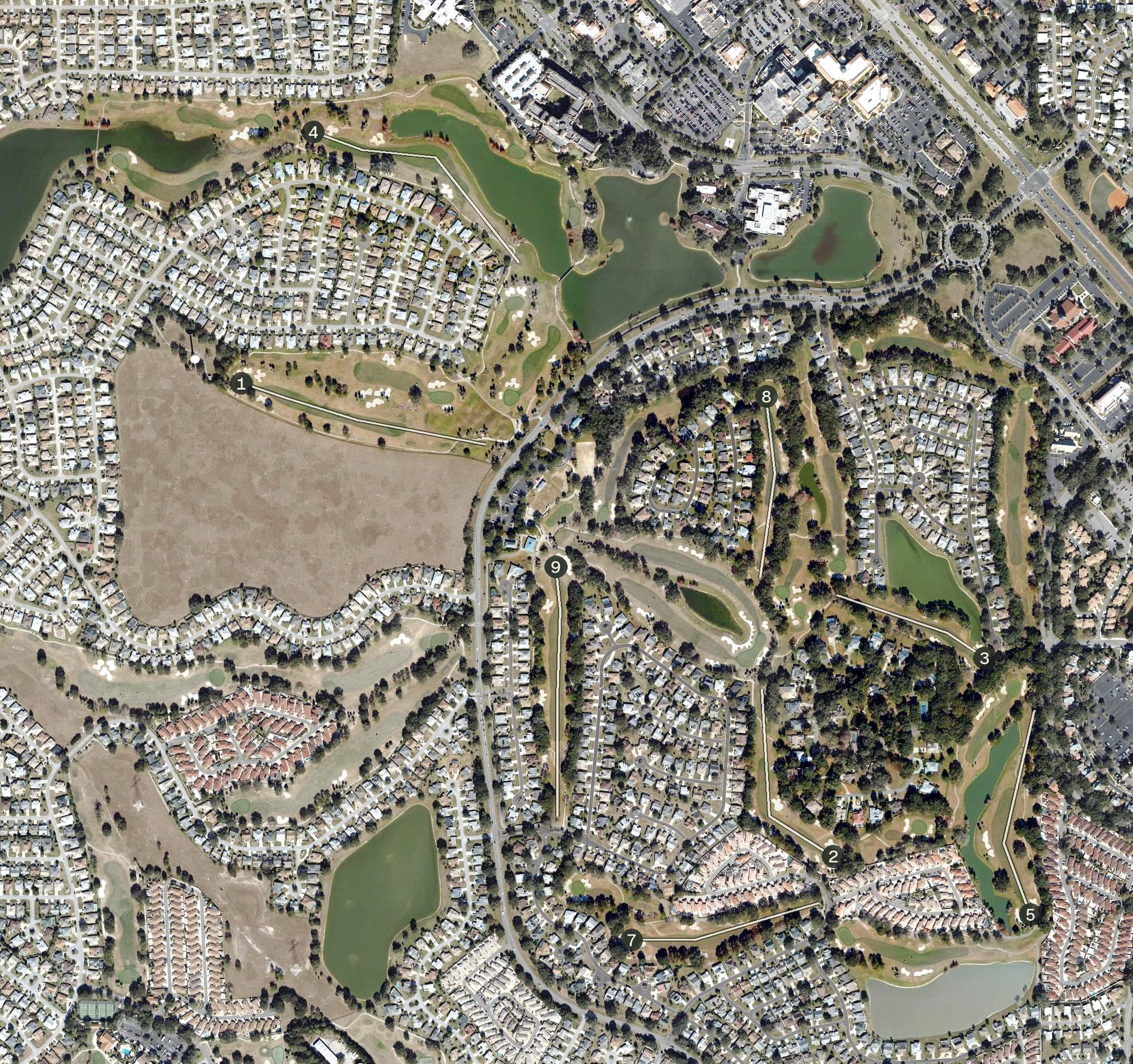 Aerial view of Hacienda Hills Golf & Country Club, FL, with its hole routing marked