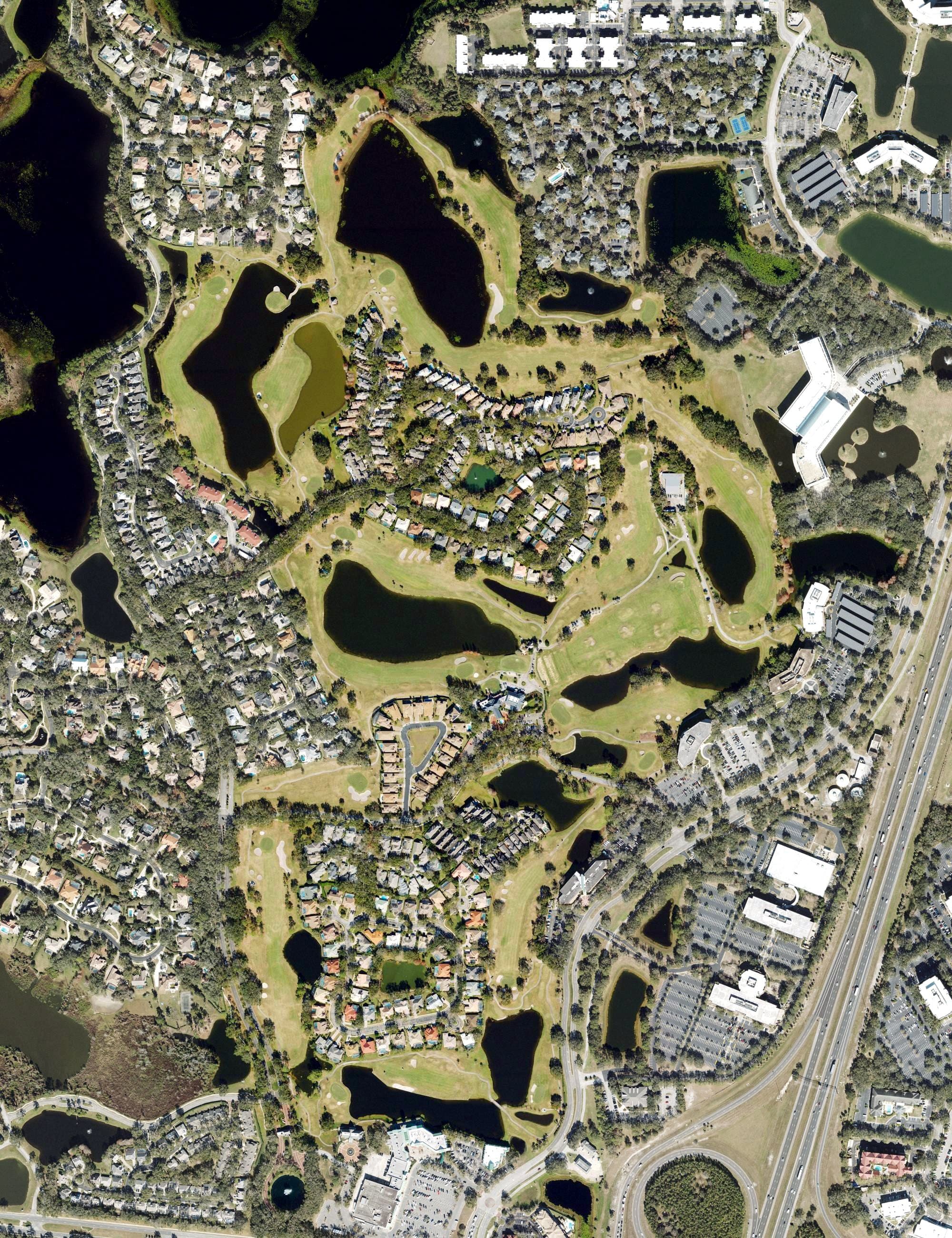 Aerial view of Heathrow Country club, FL, with its hole routing marked