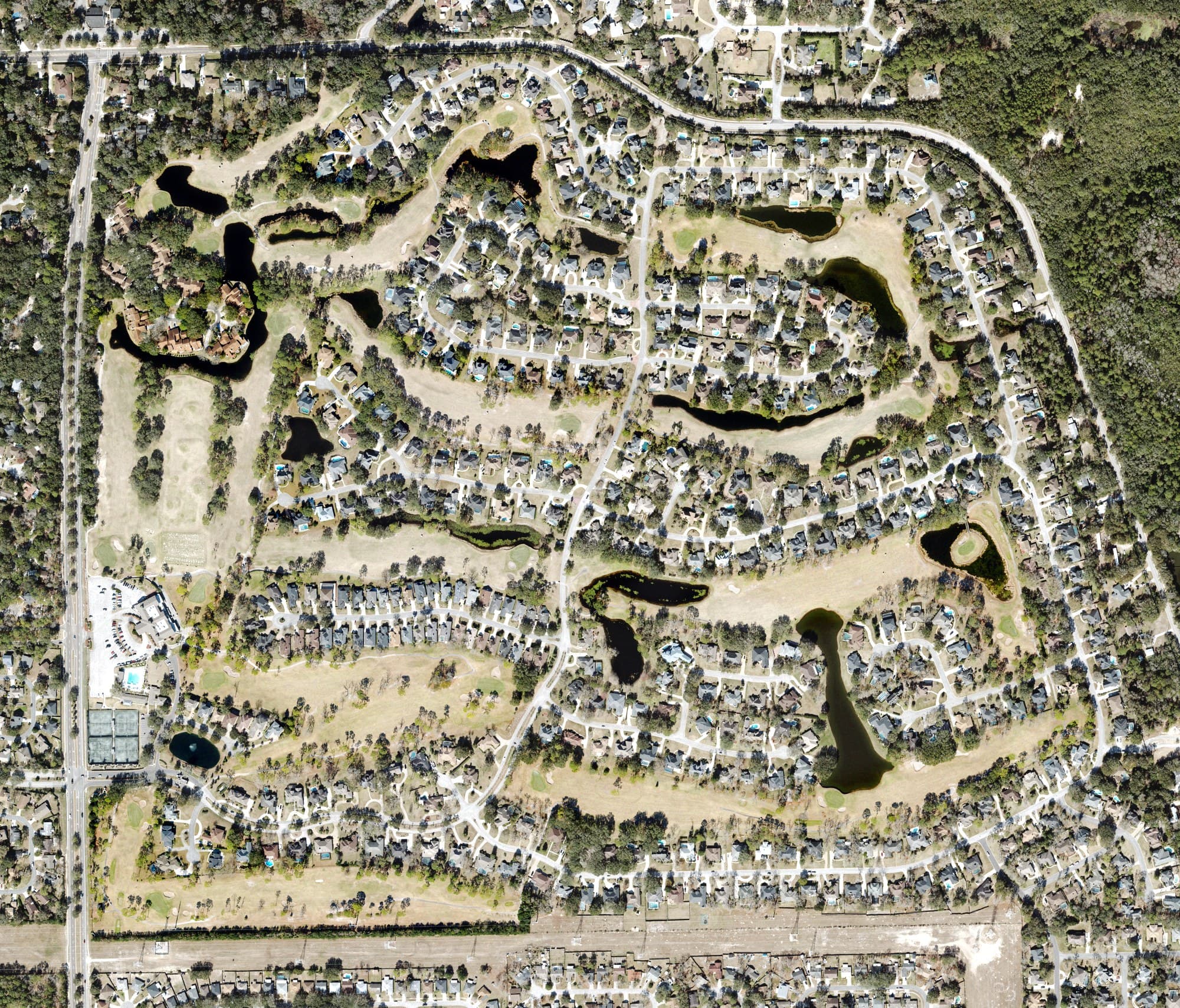 Aerial view of Hidden Hills Country Club, FL, with its hole routing marked