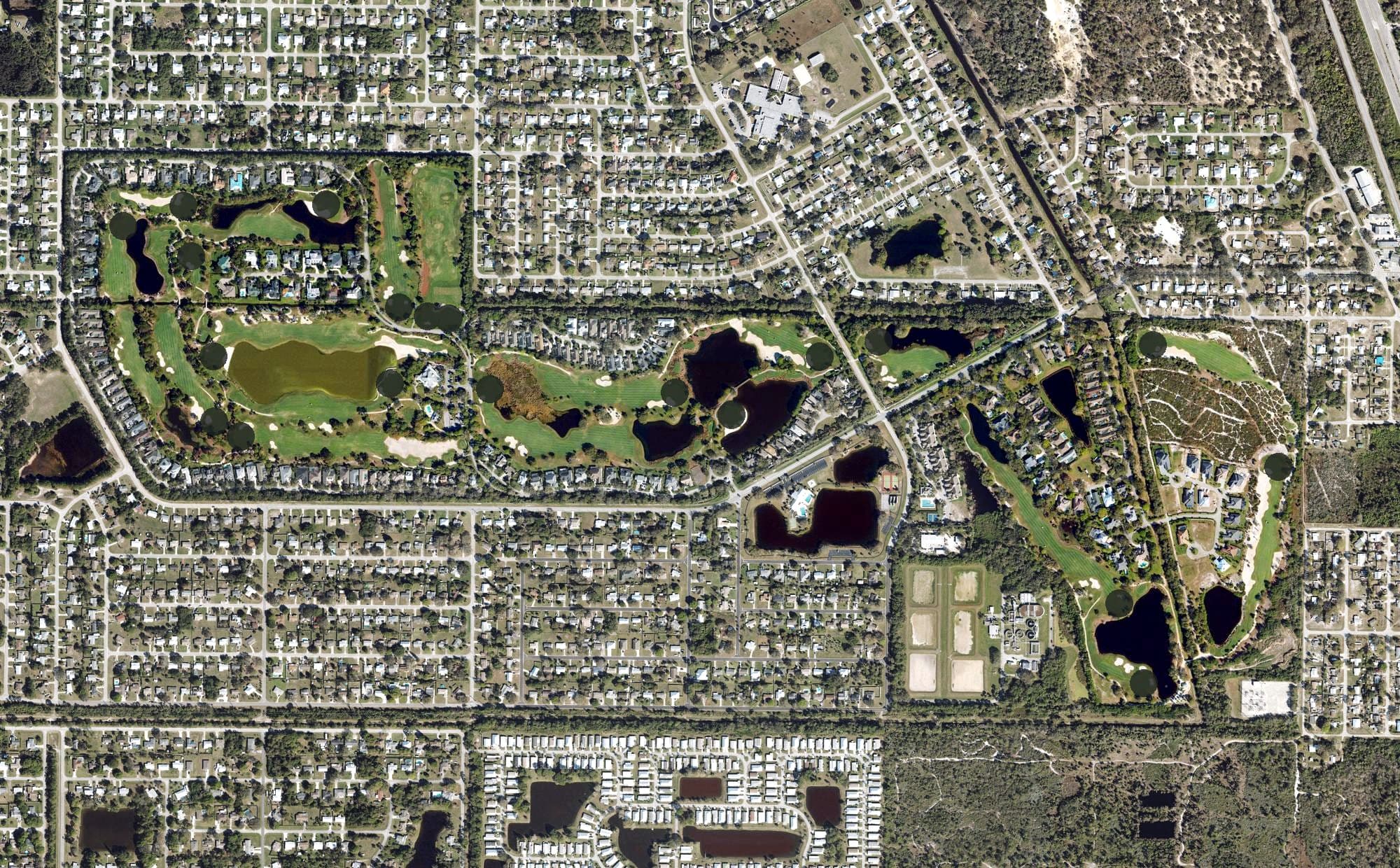 Aerial view of Indian River Club, FL, with its hole routing marked