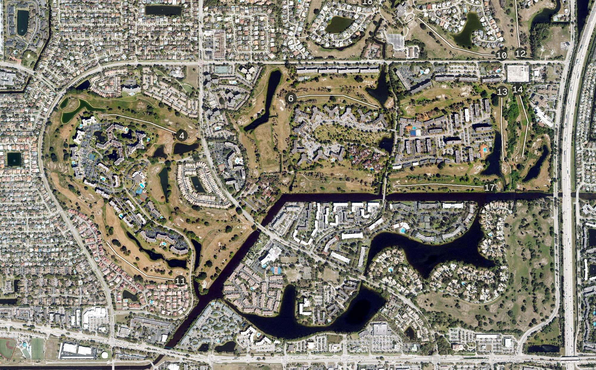 Aerial view of Inverrary Country Club, FL, with its hole routing marked