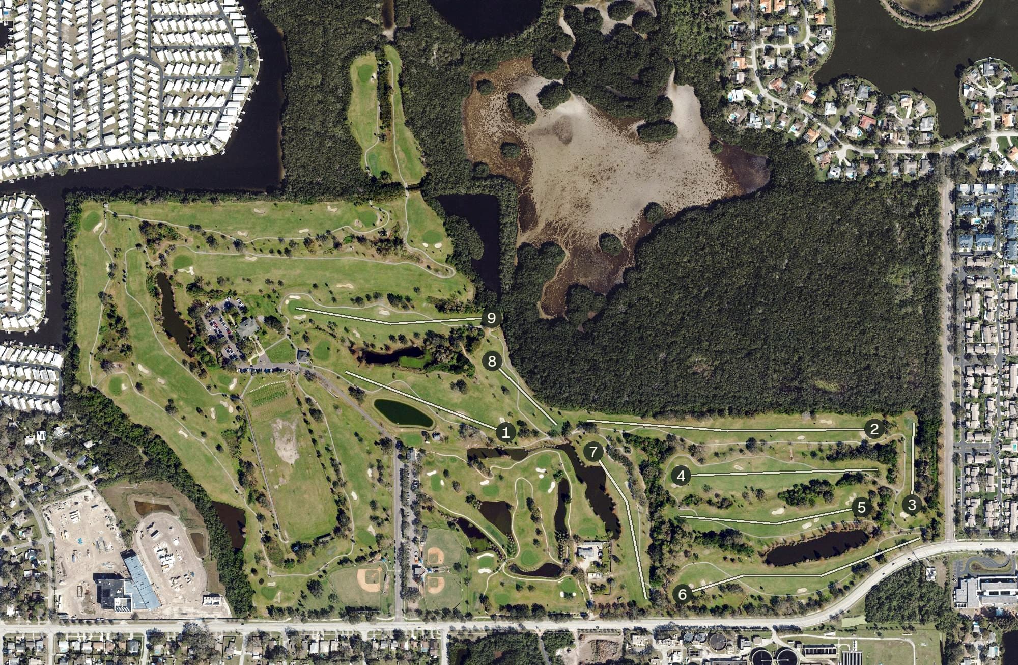 Aerial view of Mangrove Bay Municipal Golf Course, FL, with its hole routing marked