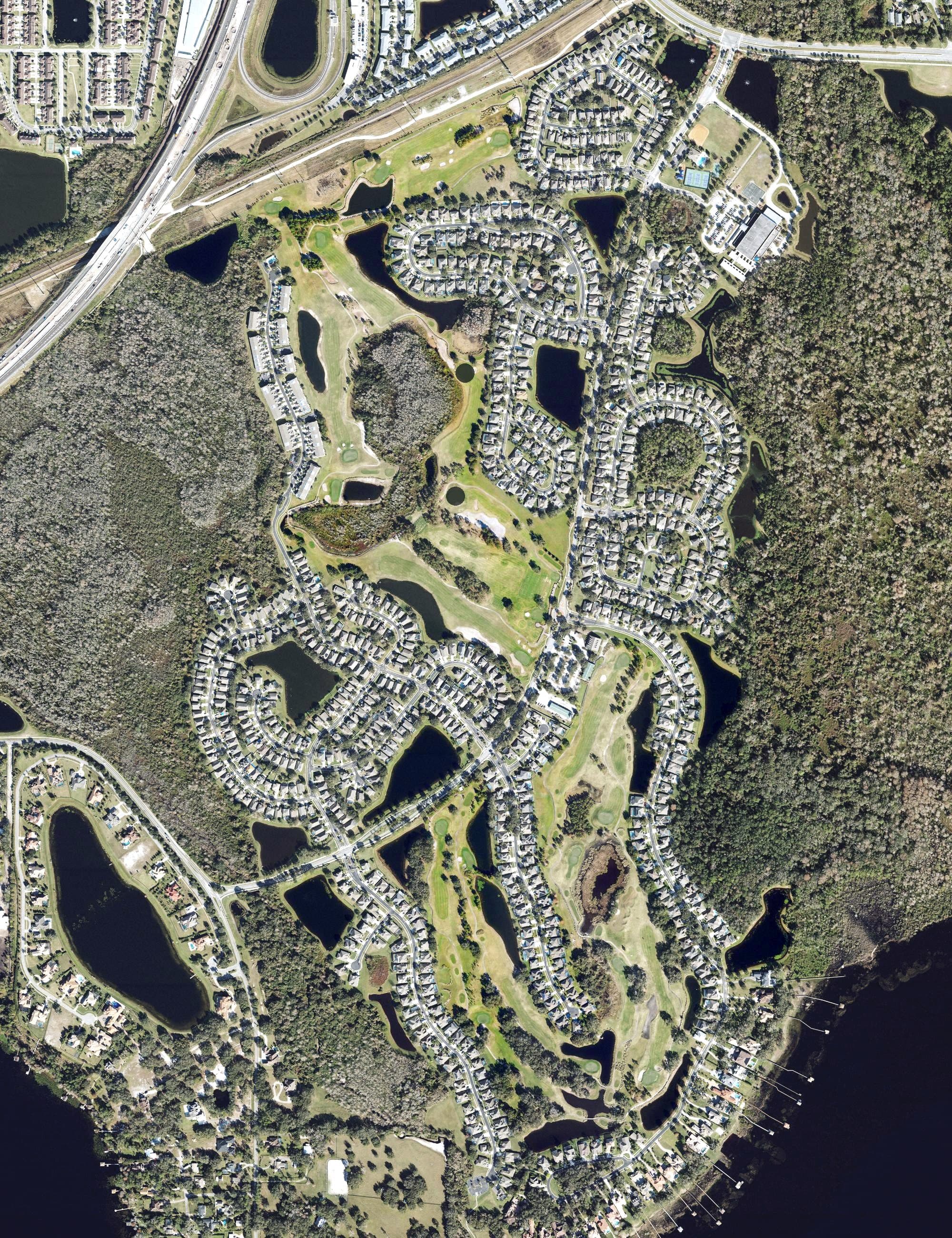 Aerial view of North Shore Golf Club, FL, with its hole routing marked