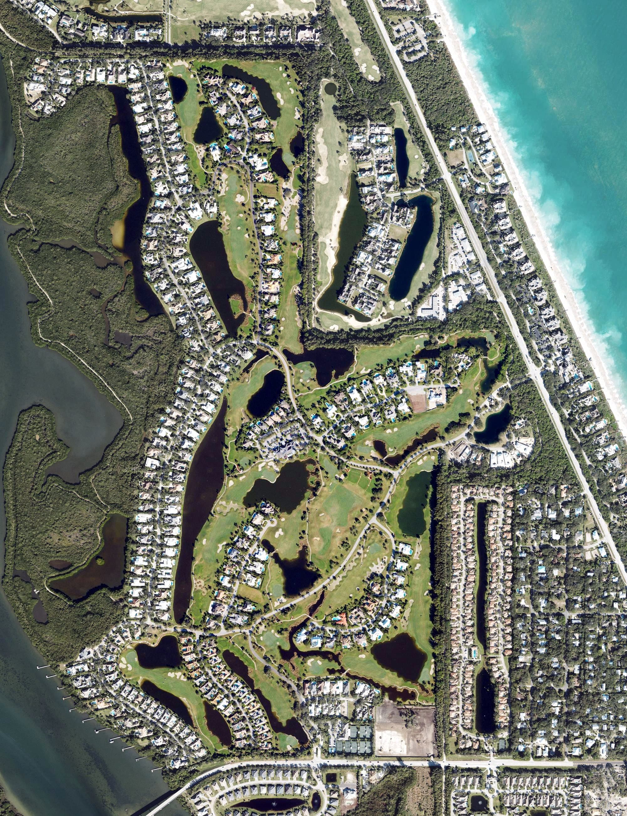 Aerial view of Orchid Island Golf & Beach Club, FL, with its hole routing marked
