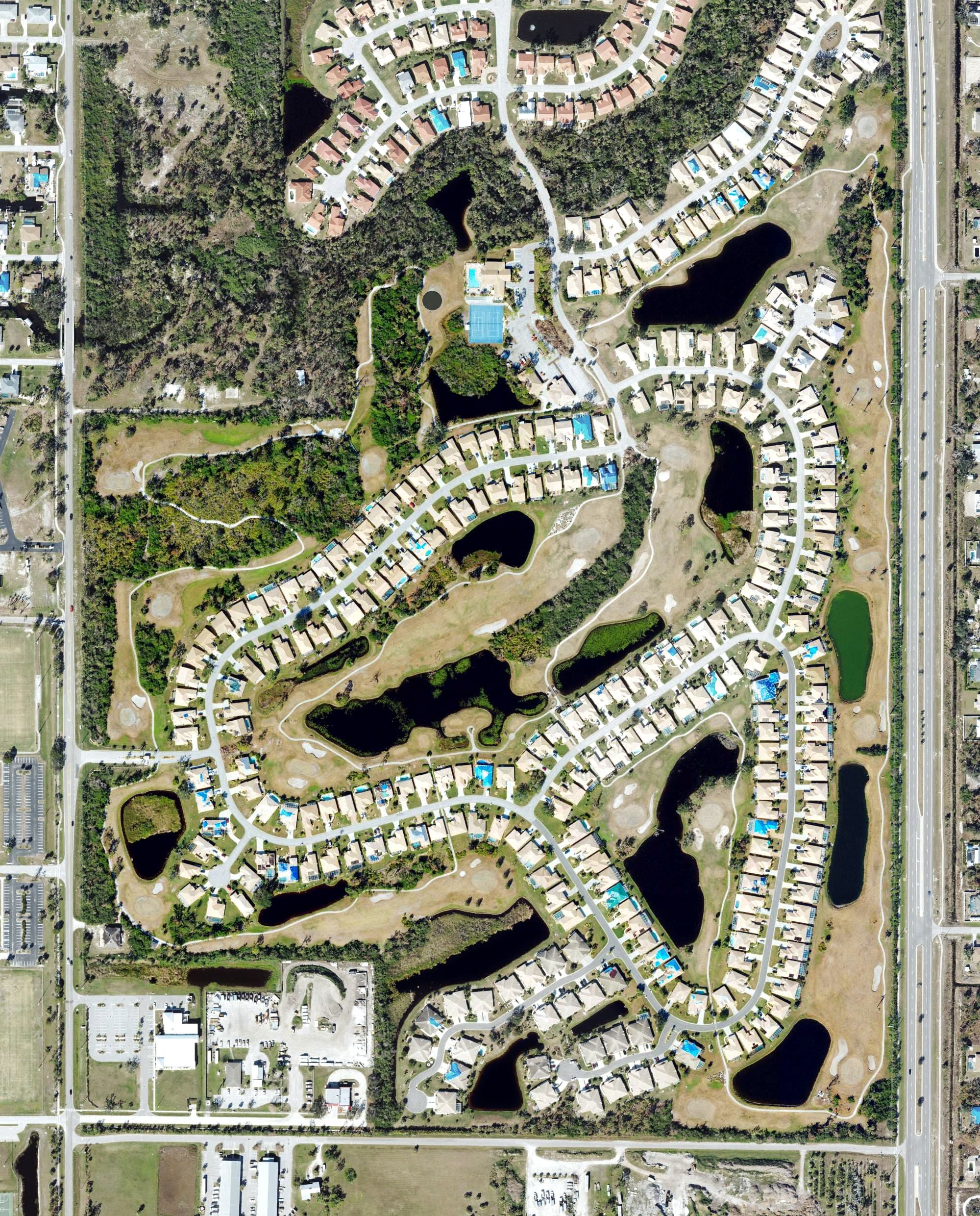 Aerial view of Oyster Creek Golf Club, FL, with its hole routing marked