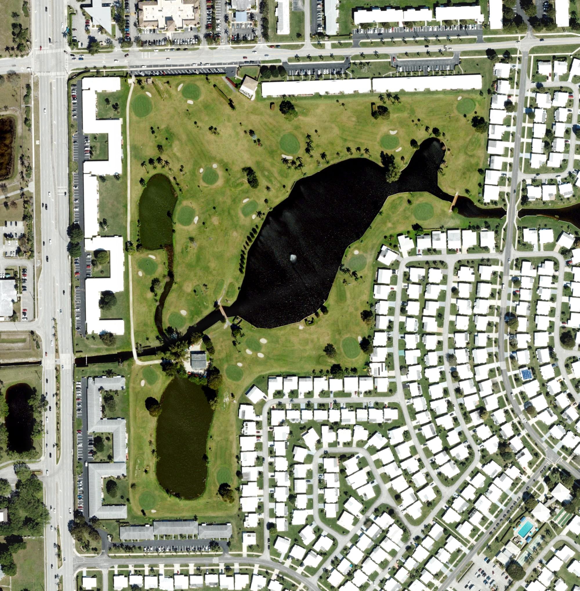 Aerial view of Palm Beach Leisureville Golf Course, FL, with its hole routing marked