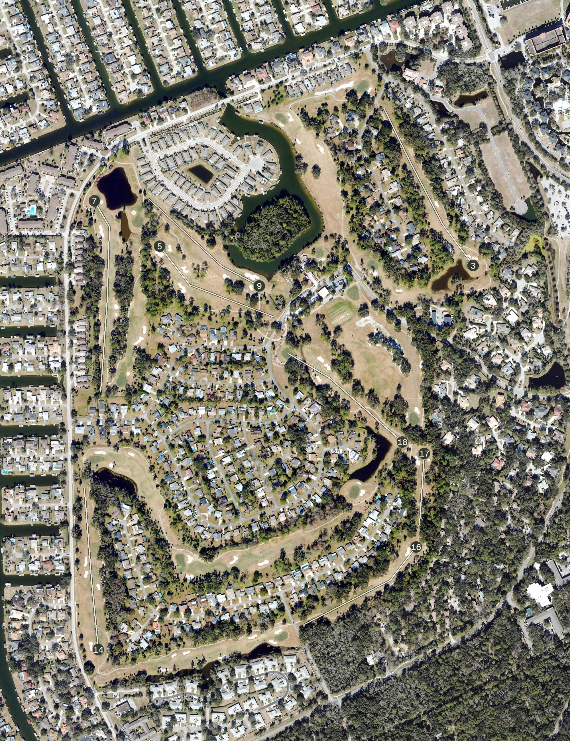 Aerial view of Palm Harbor Golf Club, FL, with its hole routing marked