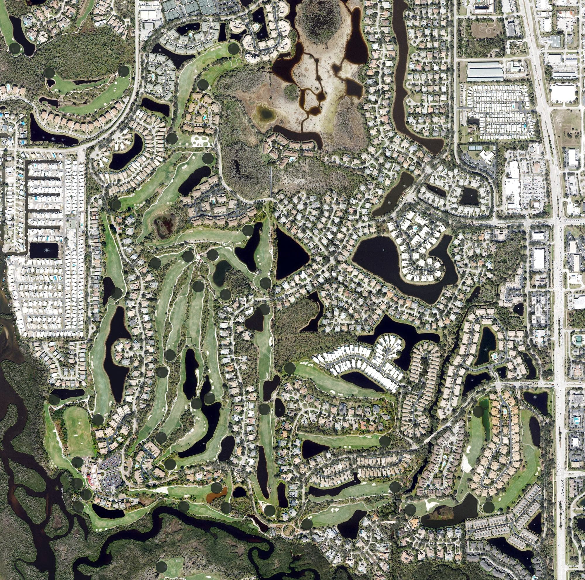 Aerial view of Pelican's Nest Golf Club, FL, with its hole routing marked