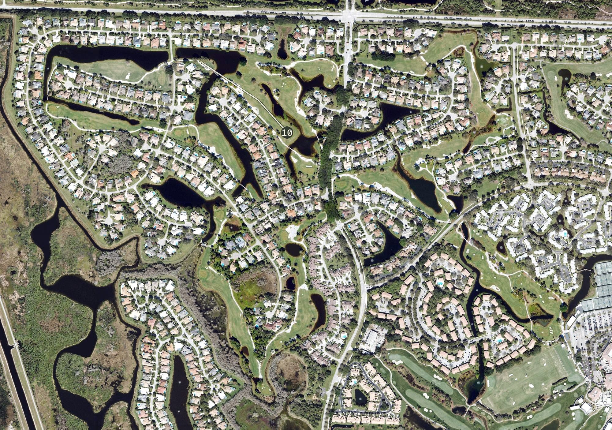 Aerial view of PGA National Resort The Squire, FL, with its hole routing marked