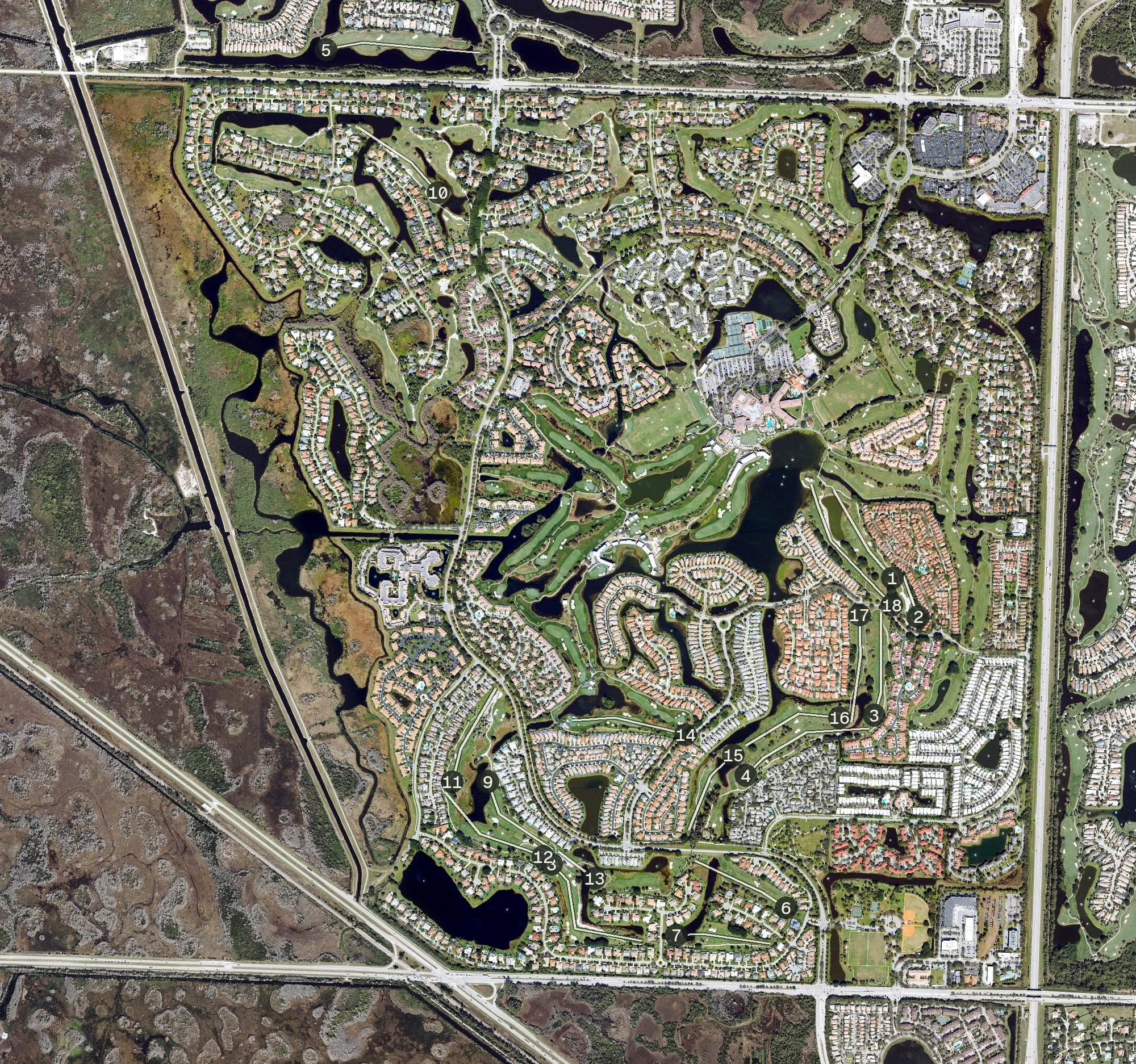Aerial view of PGA National Resort, FL, with its hole routing marked