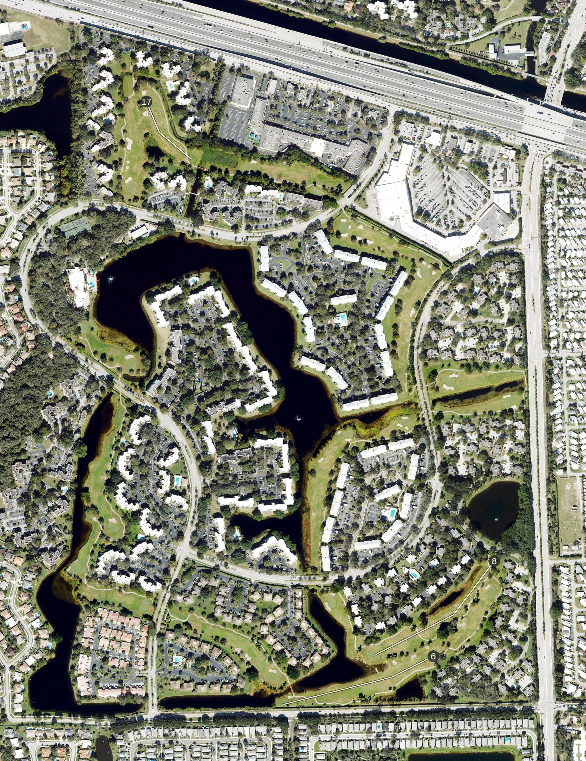 Aerial view of Pine Island Ridge Golf Course, FL, with its hole routing marked