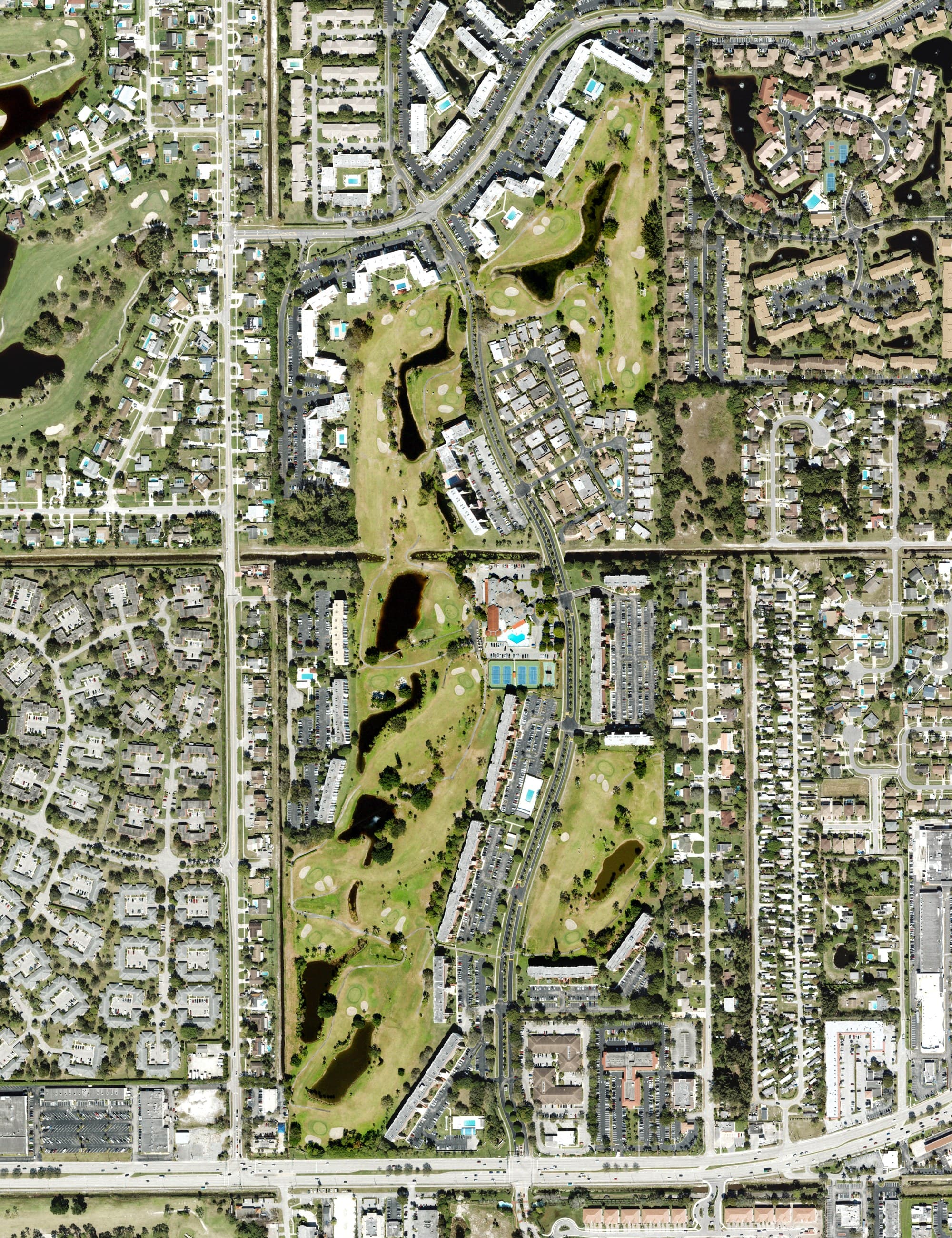 Aerial view of Poinciana Country Club, FL, with its hole routing marked