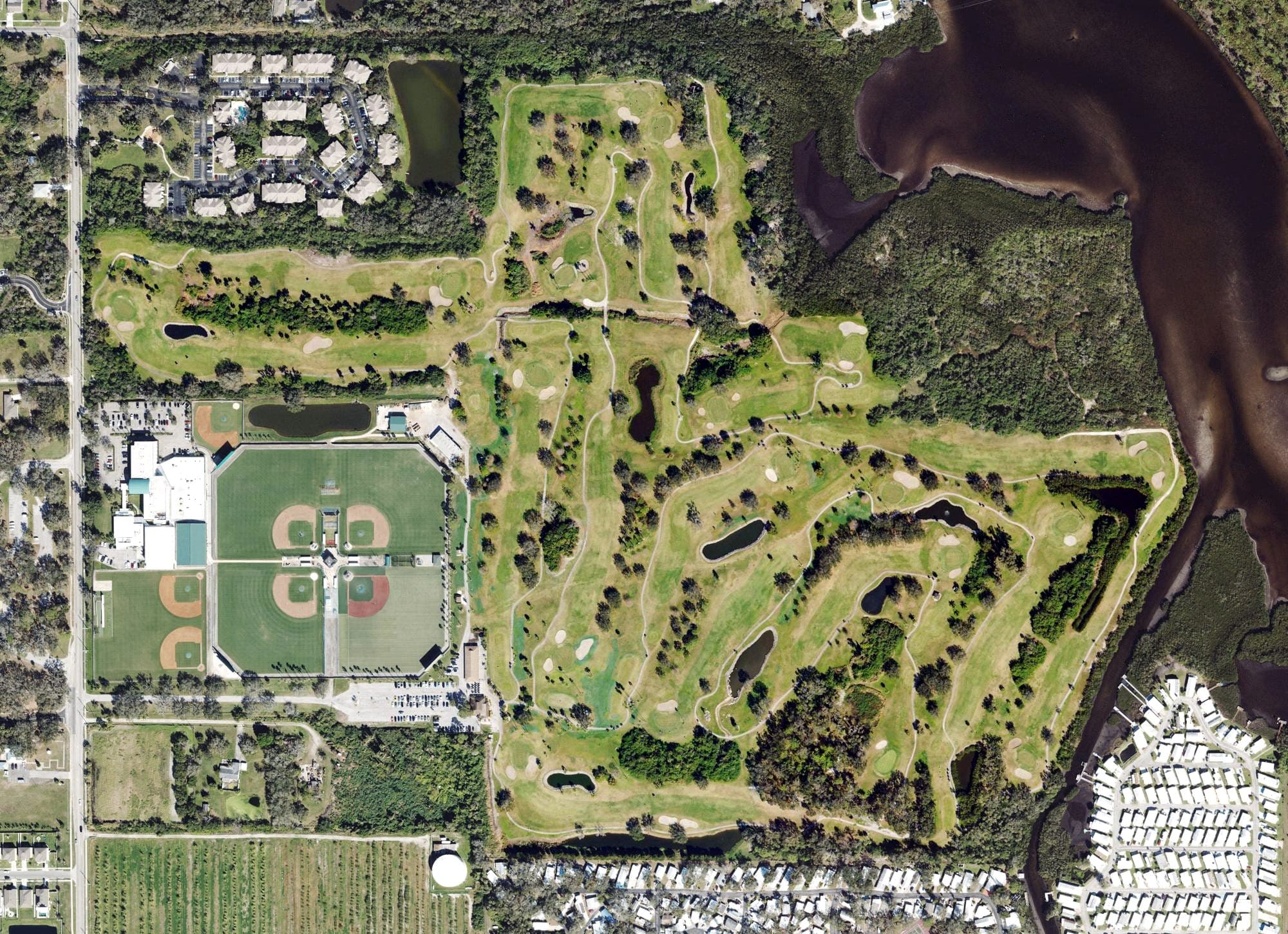 Aerial view of River Run Golf Links, FL, with its hole routing marked