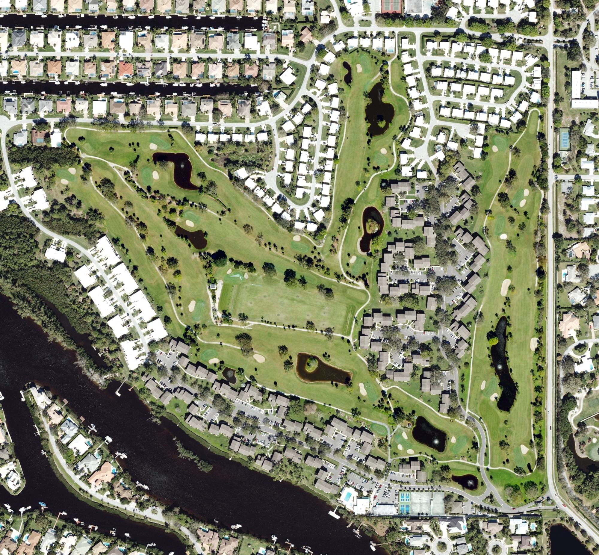 Aerial view of Riverbend Golf Club, FL, with its hole routing marked