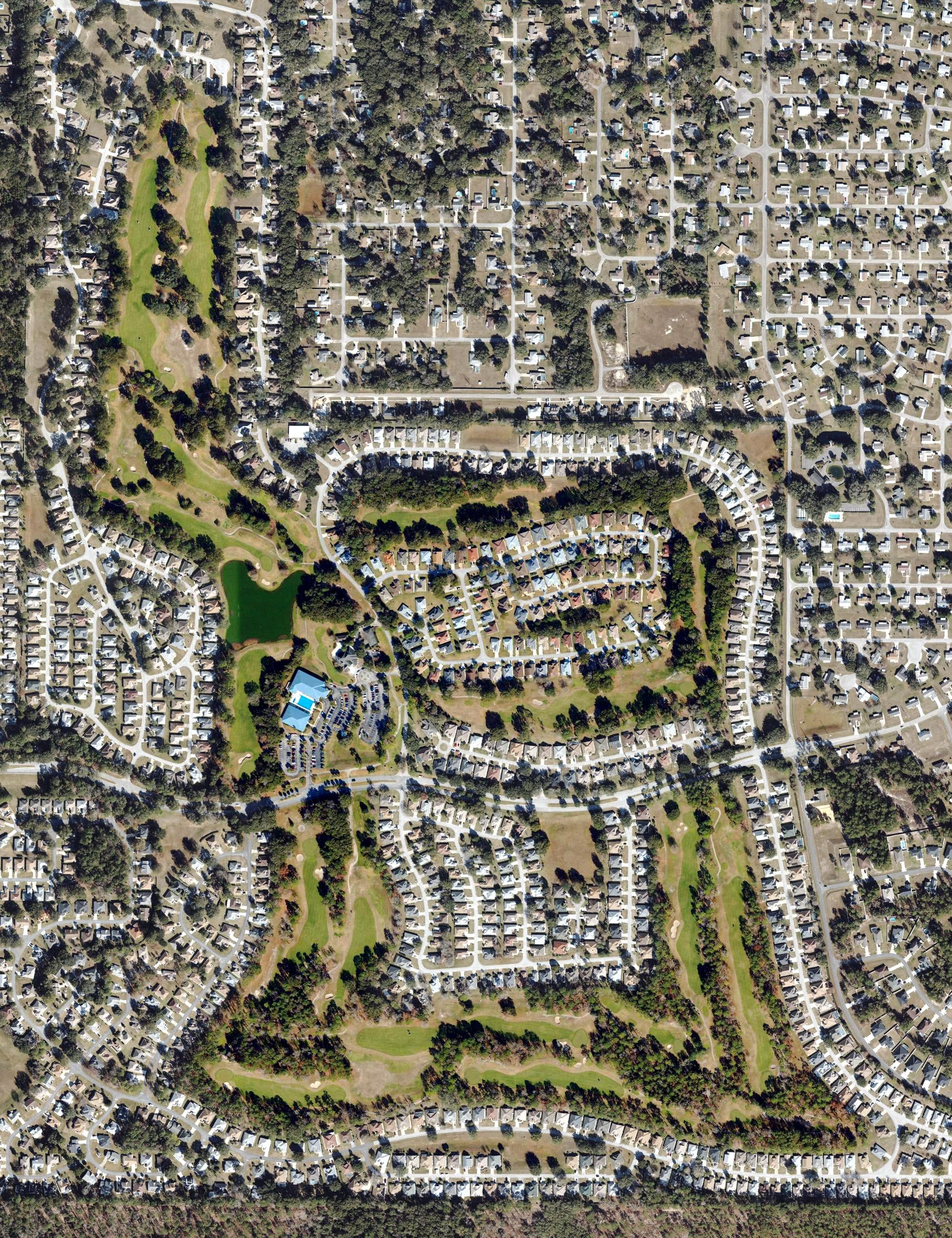 Aerial view of Royal Oaks Golf Club, FL, with its hole routing marked