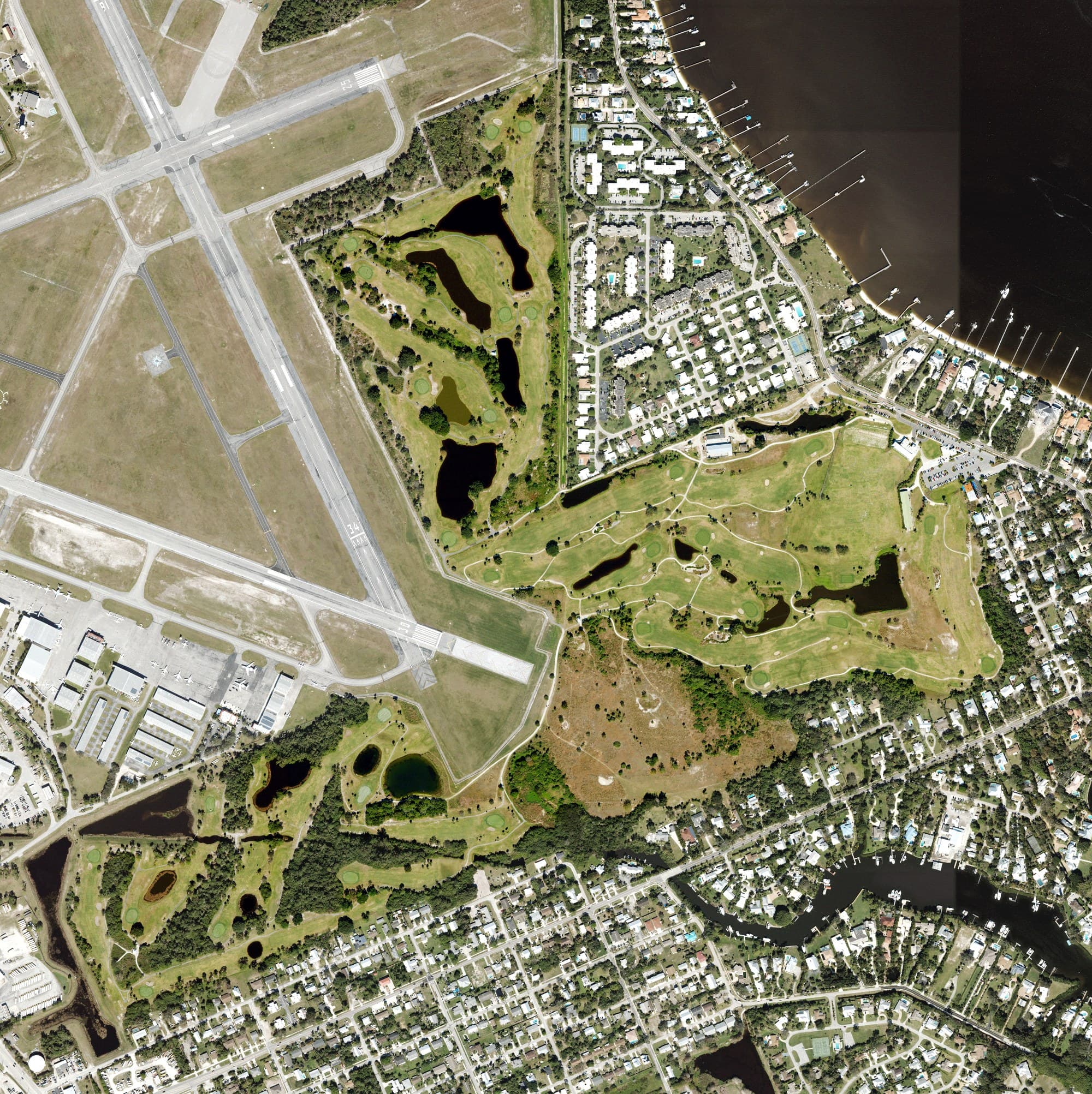 Aerial view of Sailfish Sands Golf Course, FL, with its hole routing marked