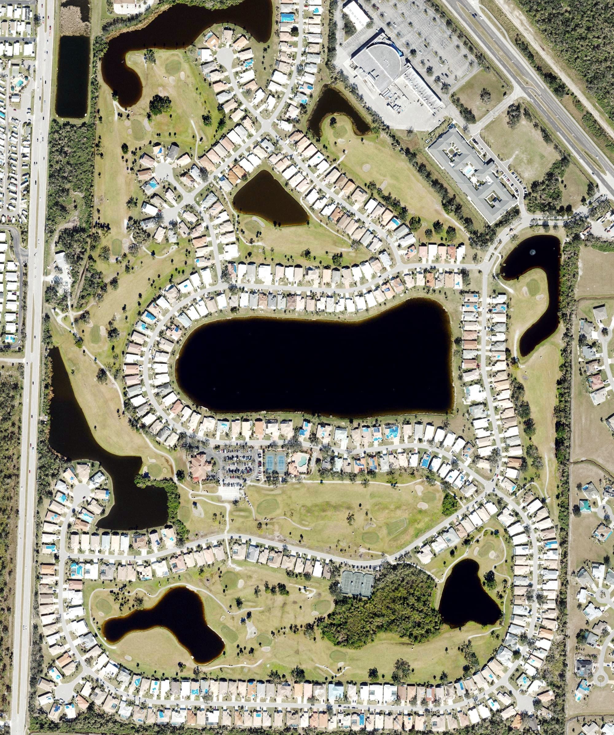 Aerial view of Seminole Lakes Golf Course, FL, with its hole routing marked