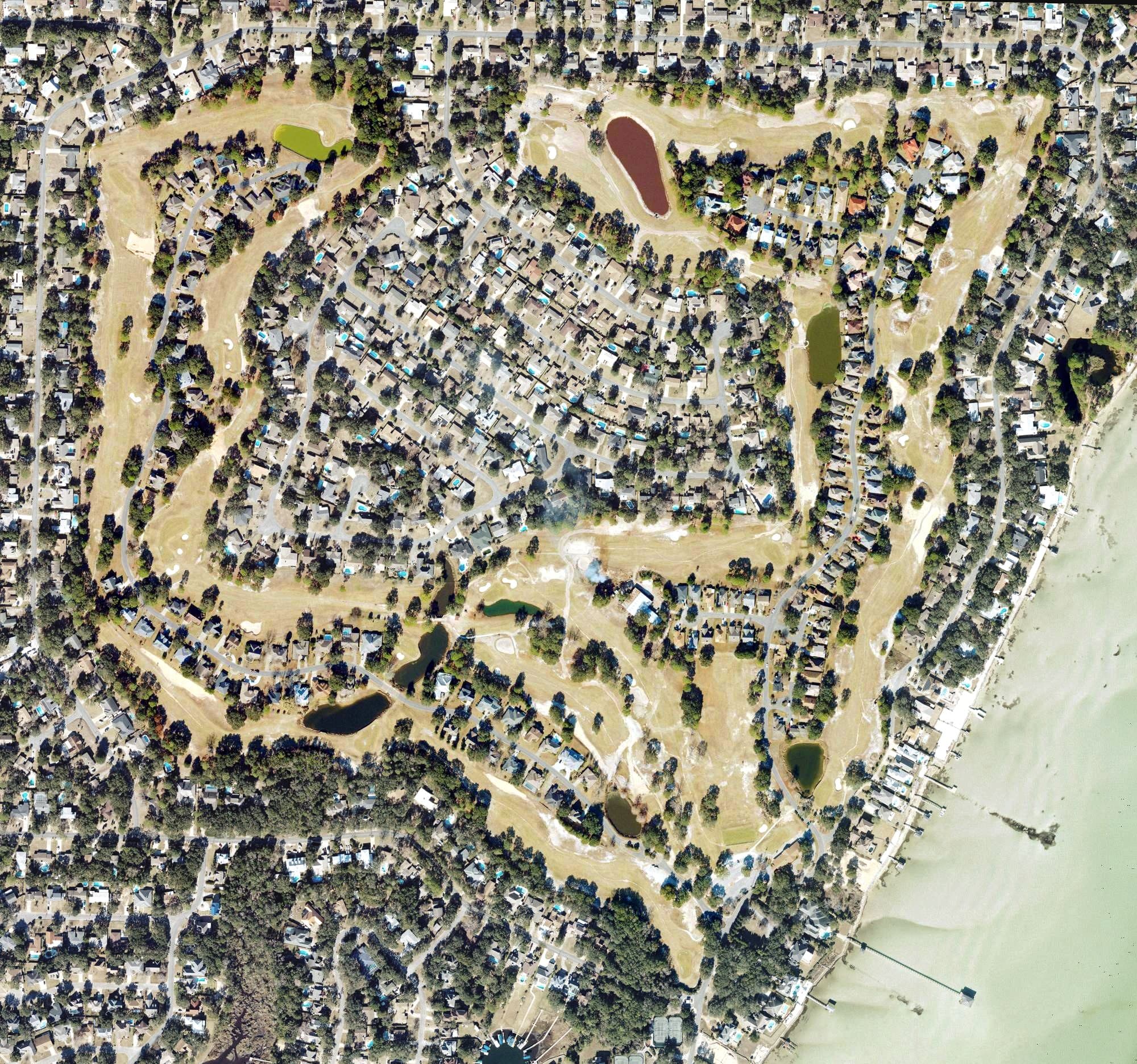 Aerial view of Shalimar Pointe Golf Club, FL, with its hole routing marked