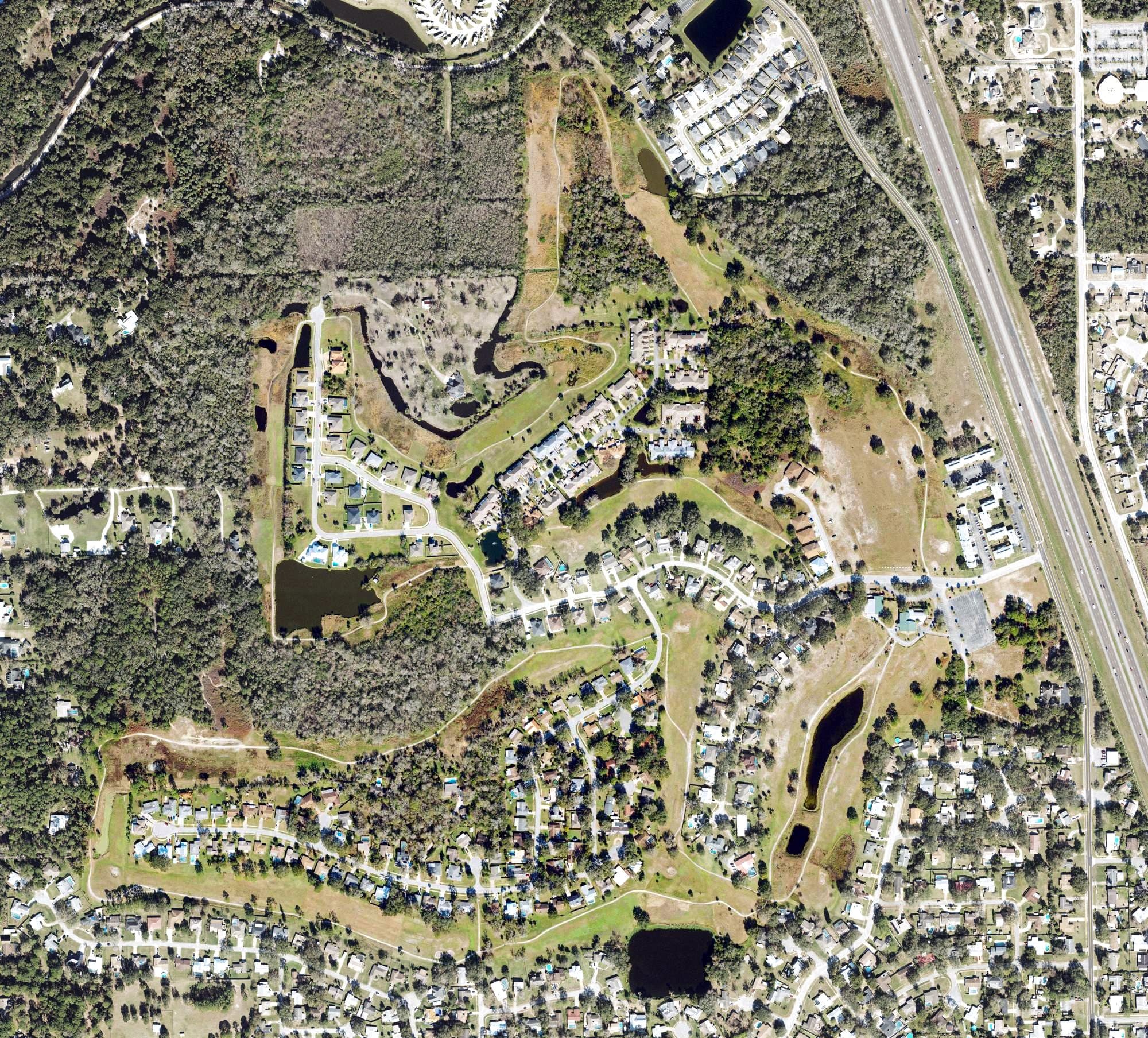 Aerial view of Sherwood Golf Club, FL, with its hole routing marked