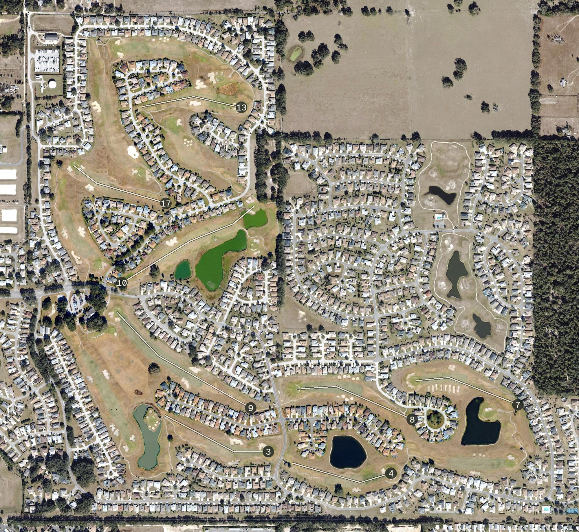 Aerial view of Stonecrest Golf Club, FL, with its hole routing marked