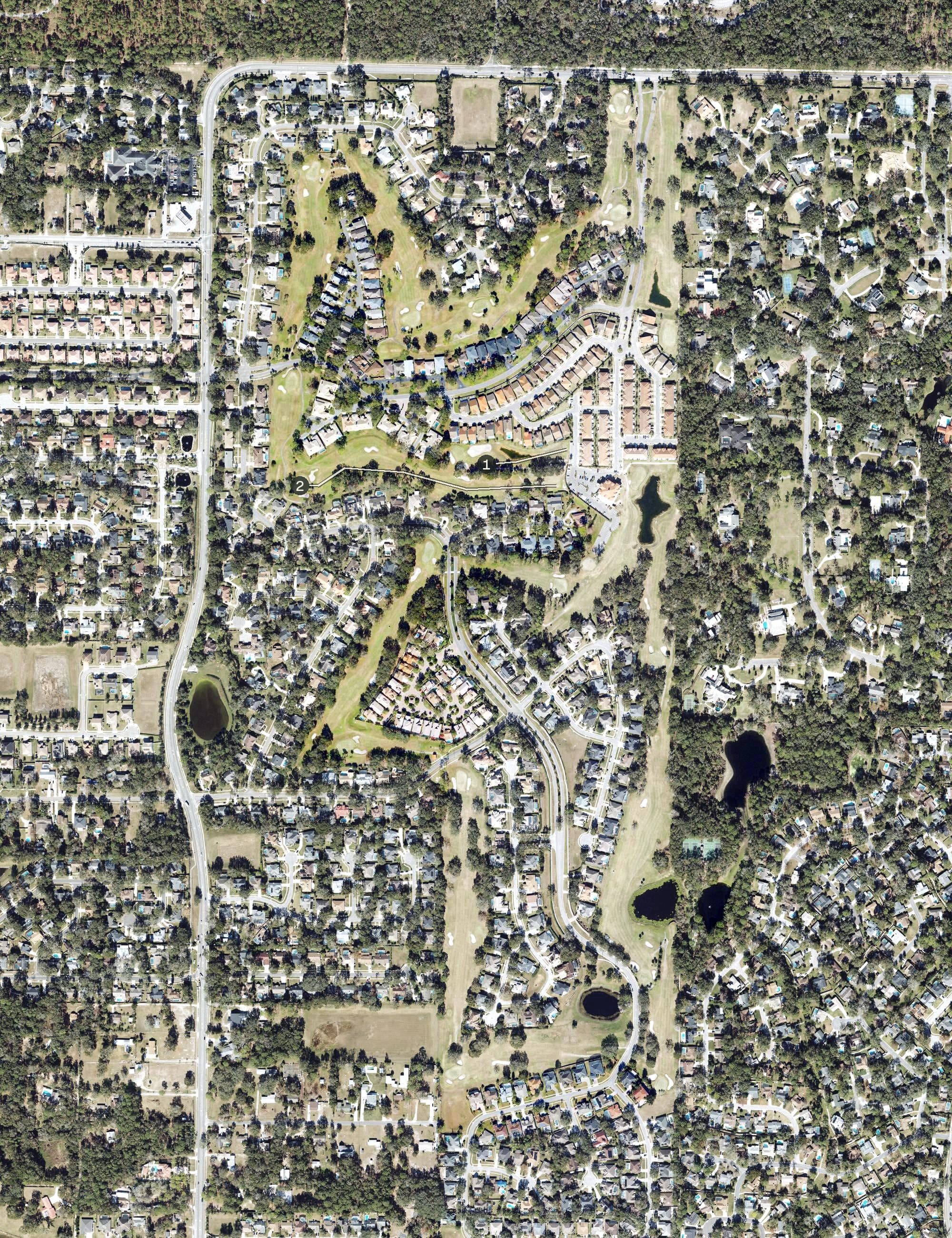 Aerial view of Sweetwater Country Club, FL, with its hole routing marked