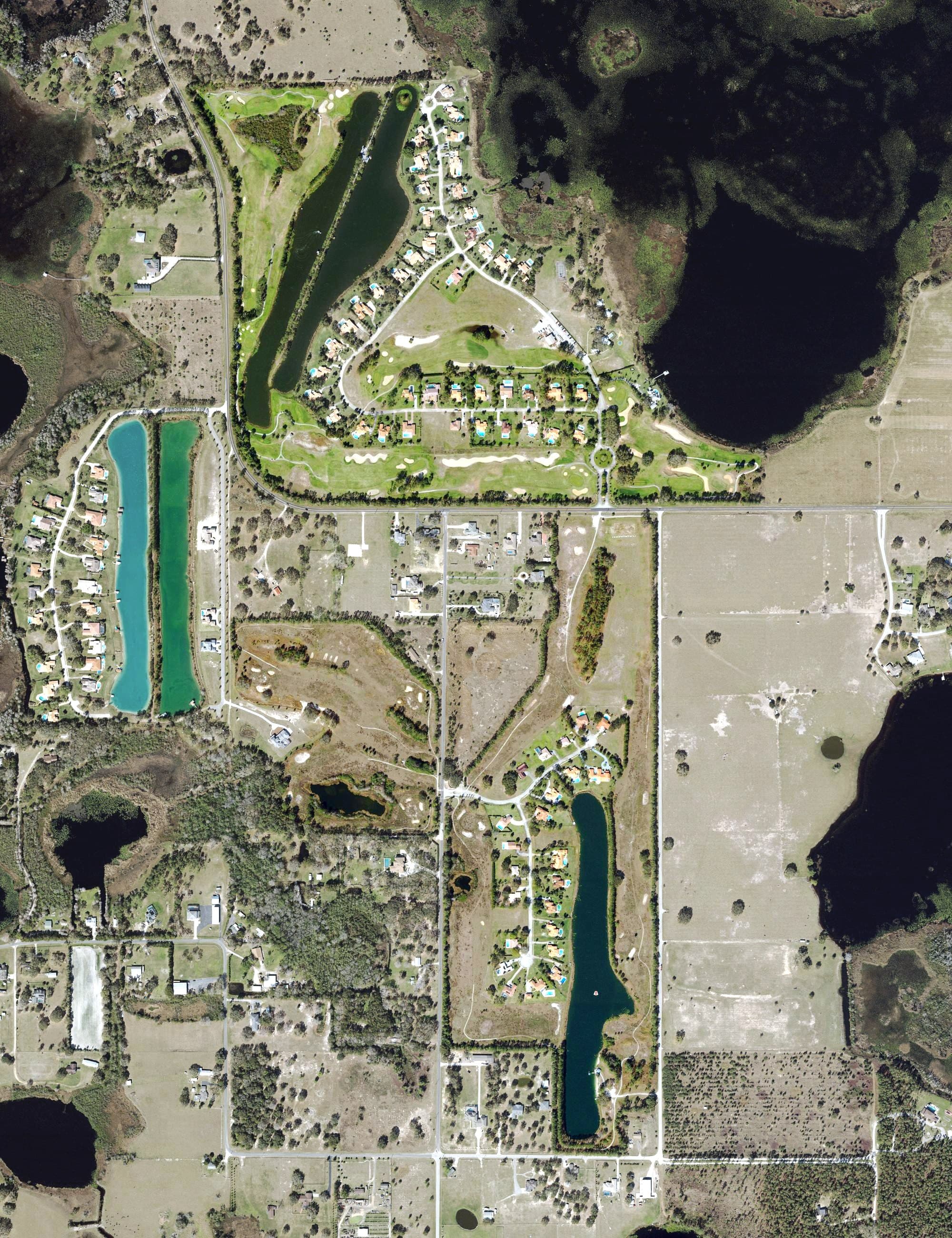 Aerial view of Swiss Fairways Golf Club, FL, with its hole routing marked