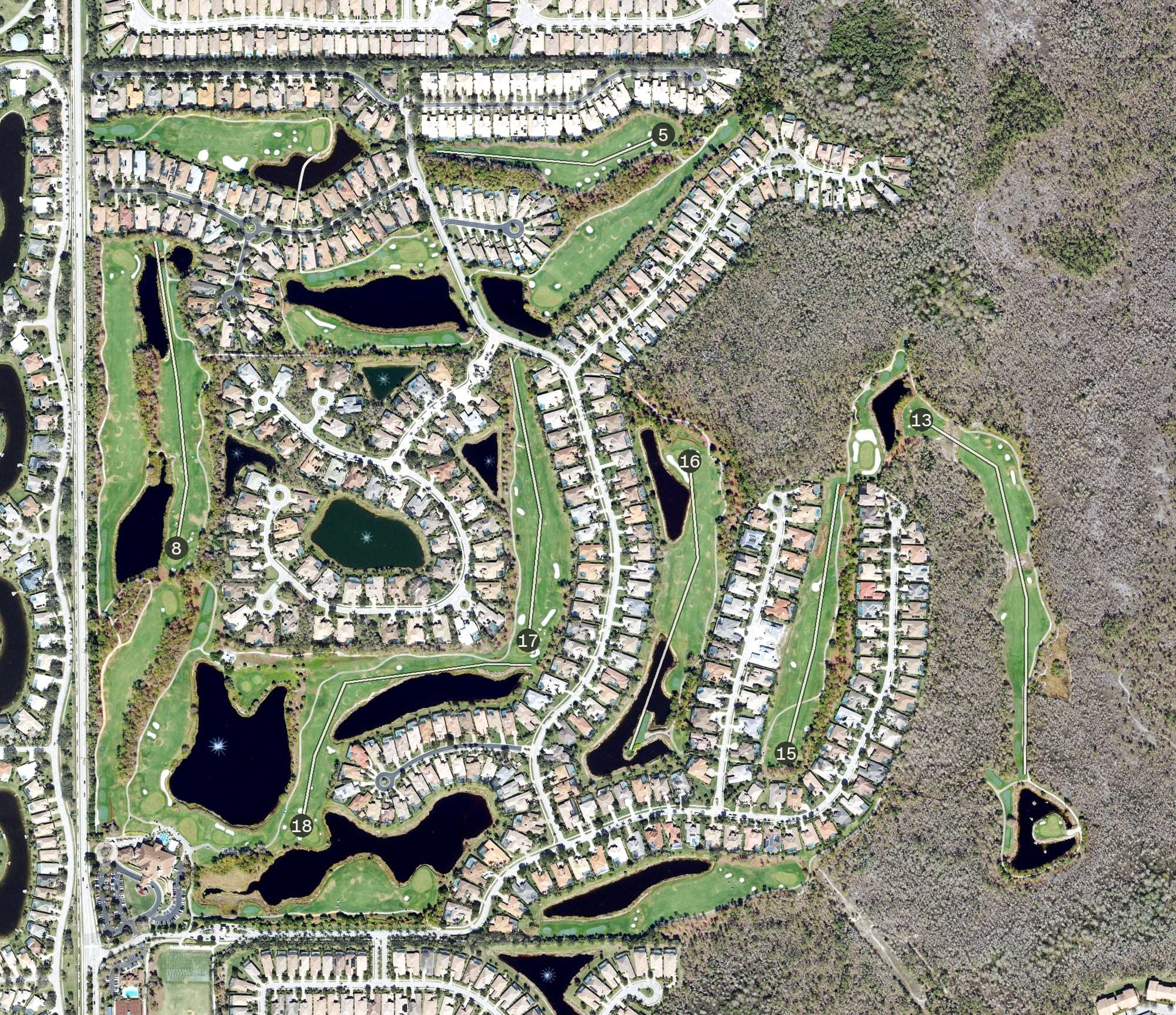 Aerial view of The Club at Olde Cypress, FL, with its hole routing marked