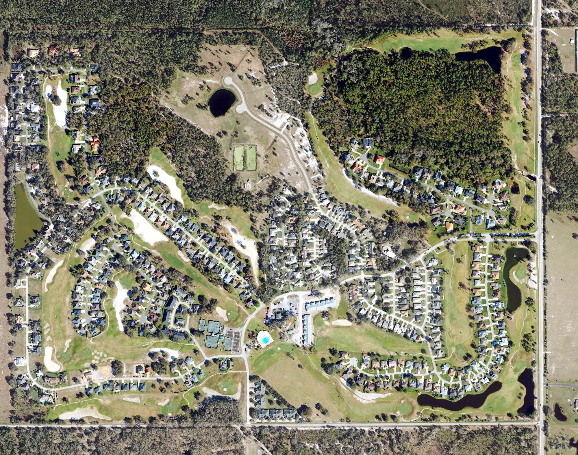 Aerial view of The Country Club of Sebring, FL, with its hole routing marked