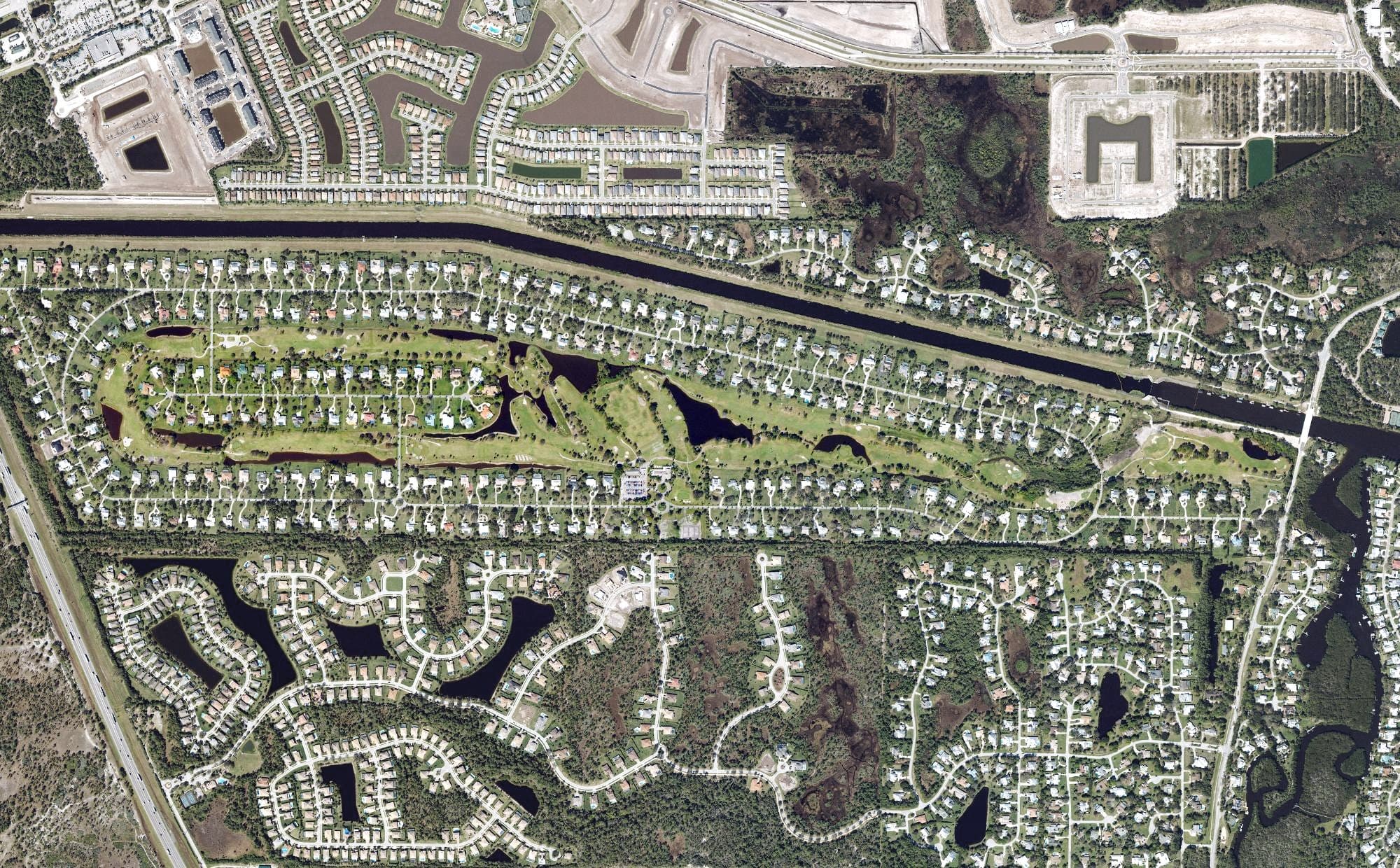 Aerial view of The Evergreen Club, FL, with its hole routing marked