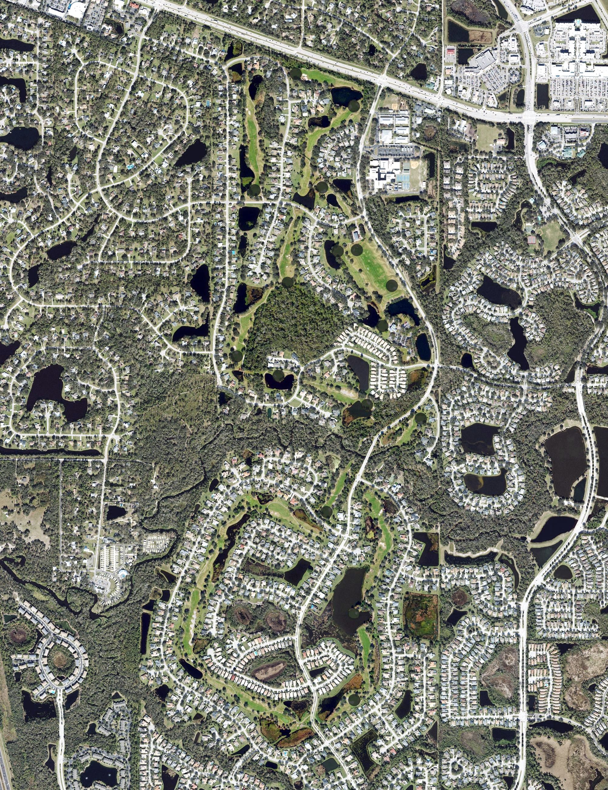 Aerial view of The River Club, FL, with its hole routing marked