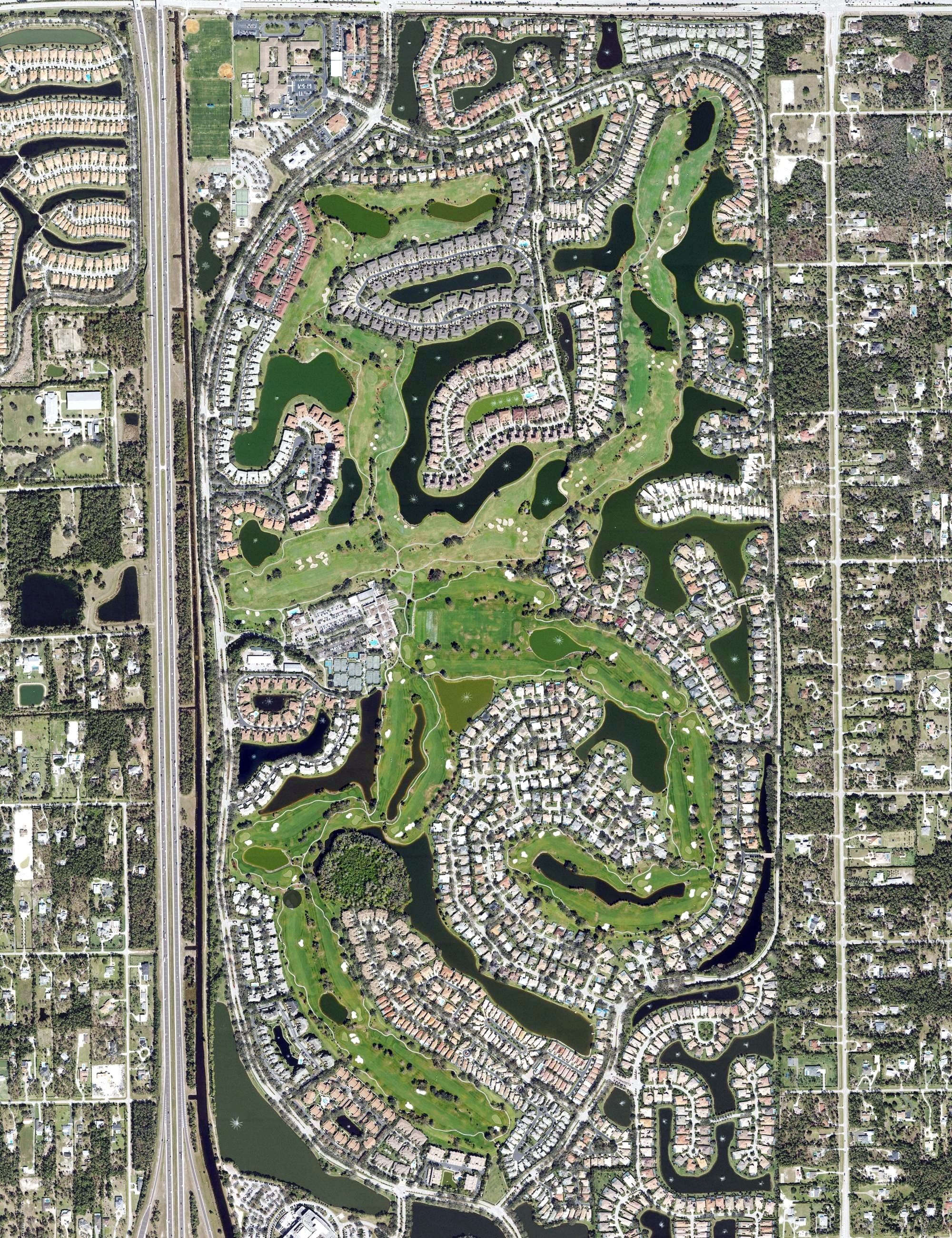 Aerial view of Vineyards Country Club, FL, with its hole routing marked