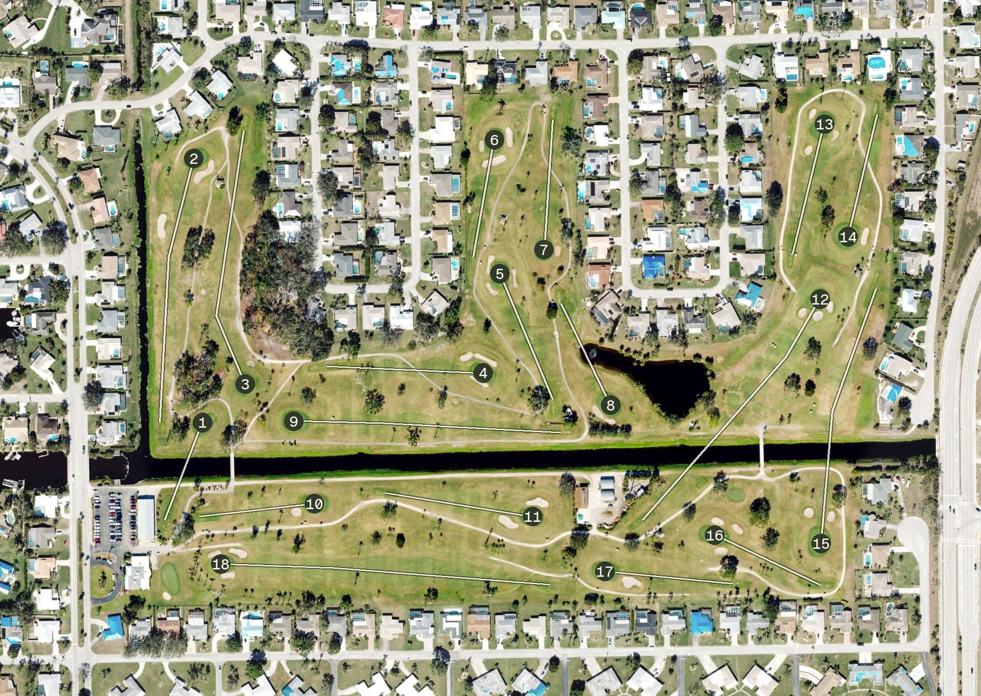 Aerial view of Whiskey Creek Country Club, FL, with its hole routing marked