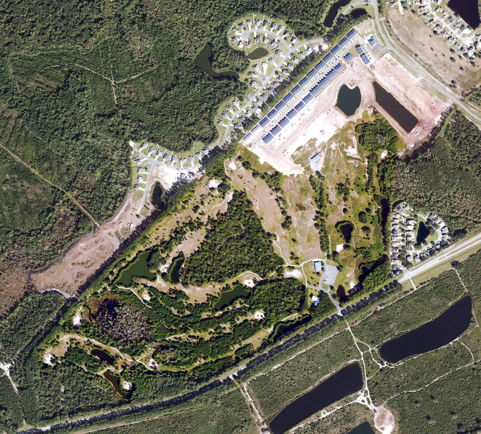 Aerial view of Coastal Pines Golf Course, GA, with its hole routing marked