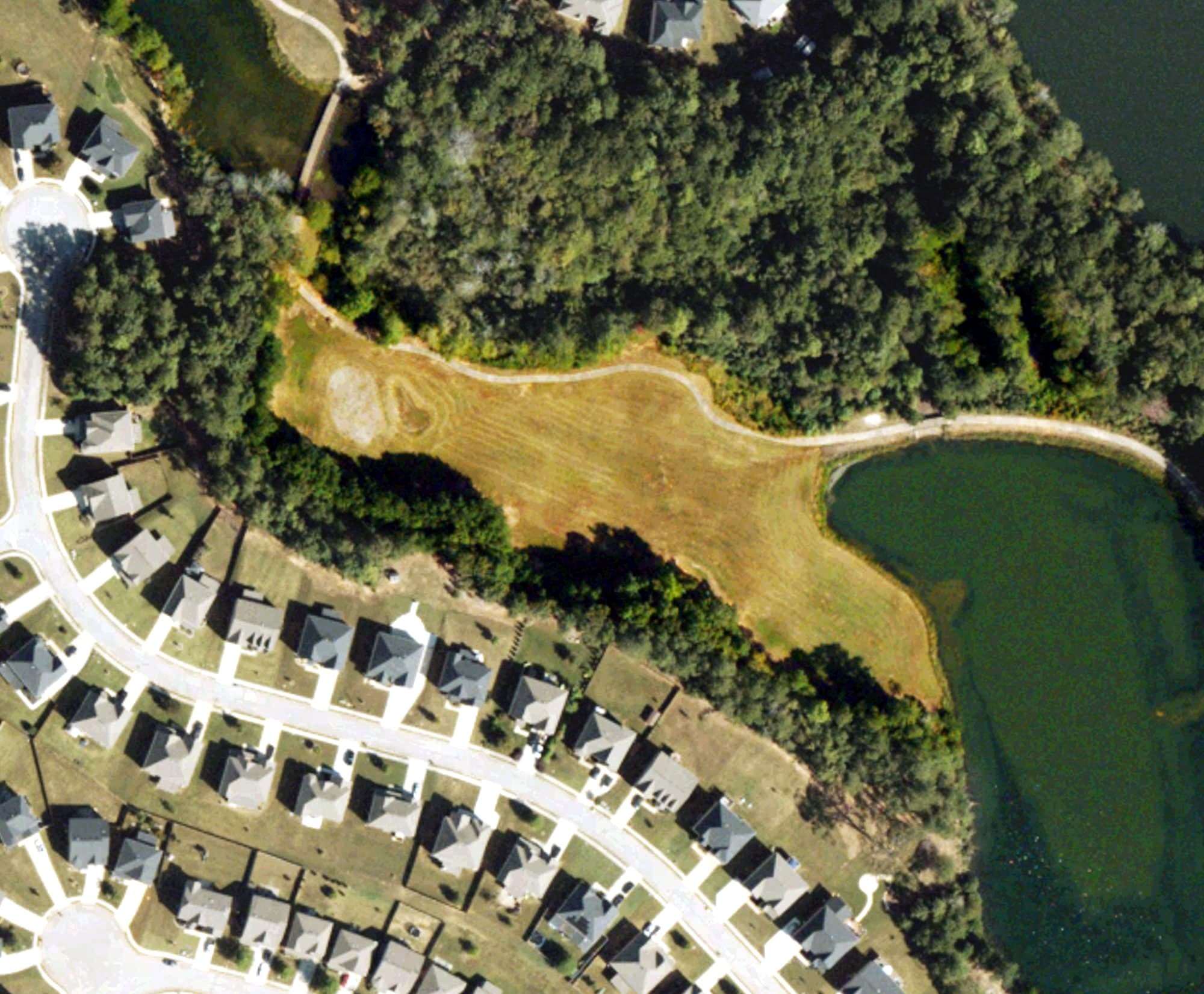 Aerial view of Durham Lakes Country Club, GA, with its hole routing marked