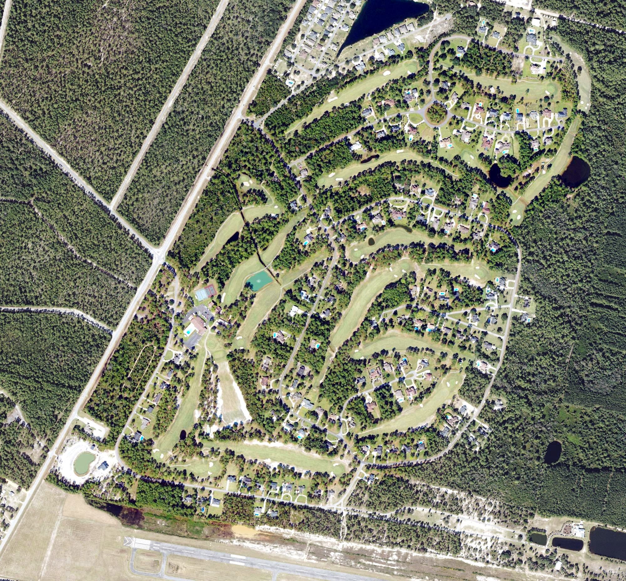 Aerial view of Pine Forest Country Club, GA, with its hole routing marked