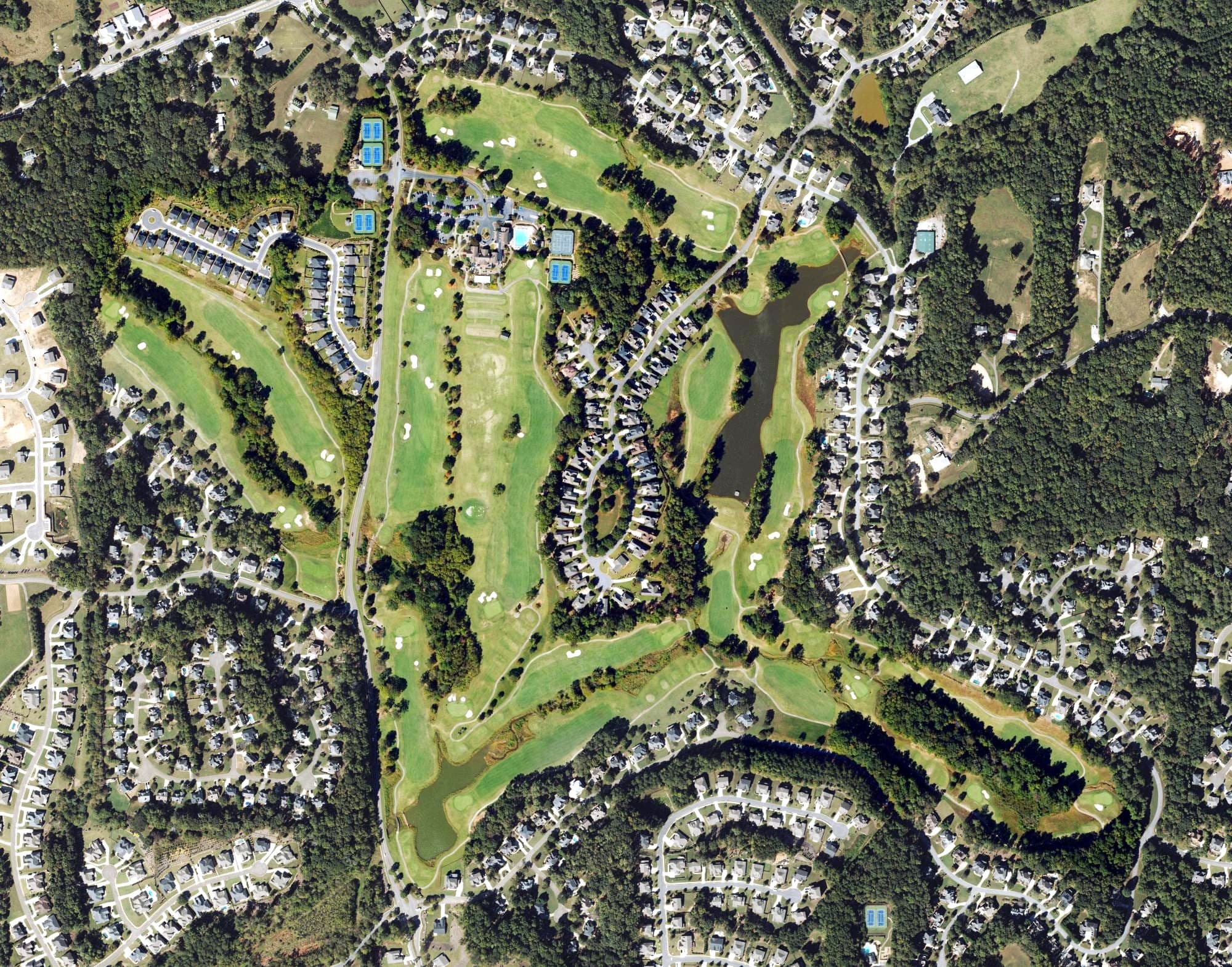 Aerial view of Woodmont Golf and Country Club, GA, with its hole routing marked