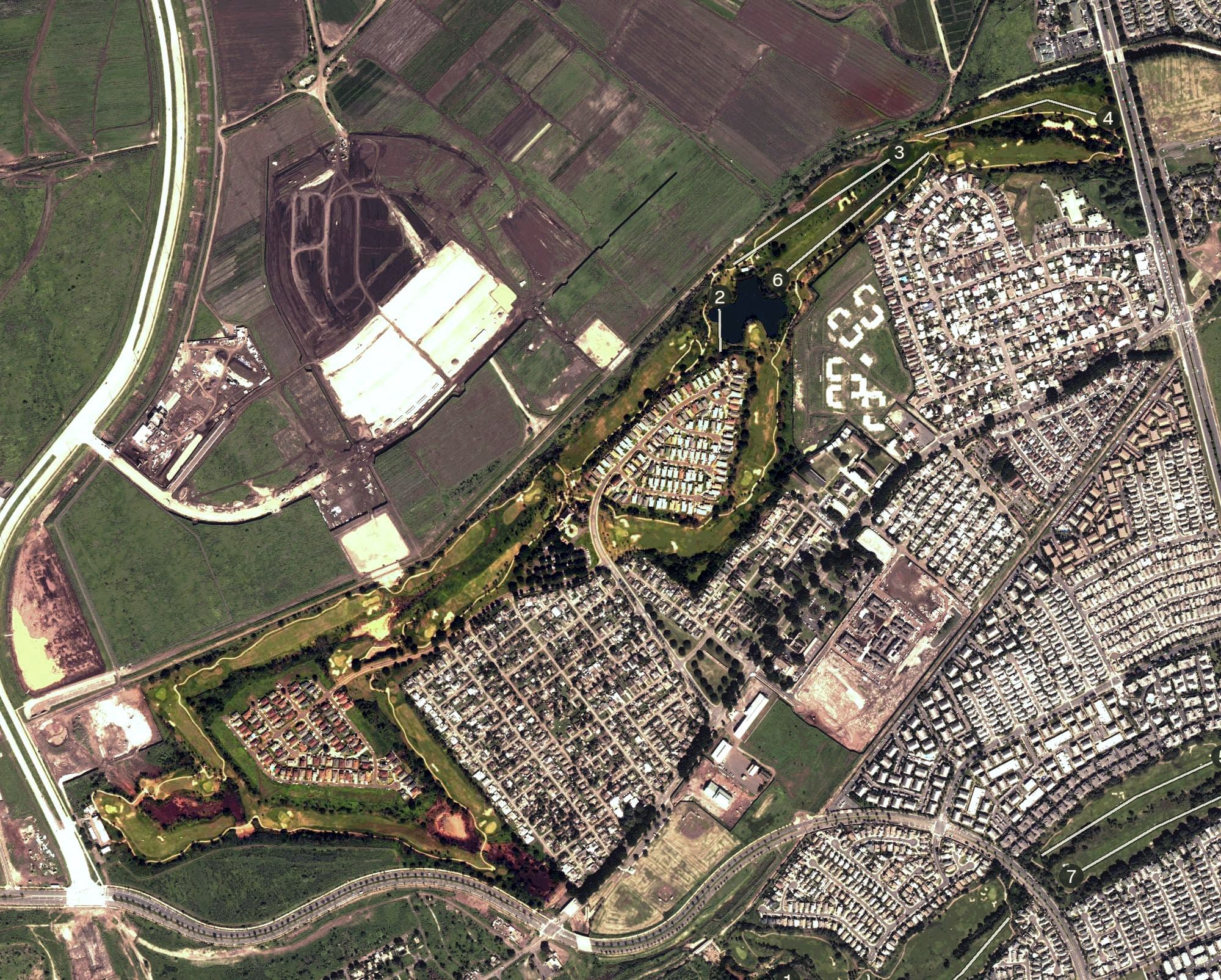 Aerial view of Ewa Villages Golf Course, HI, with its hole routing marked