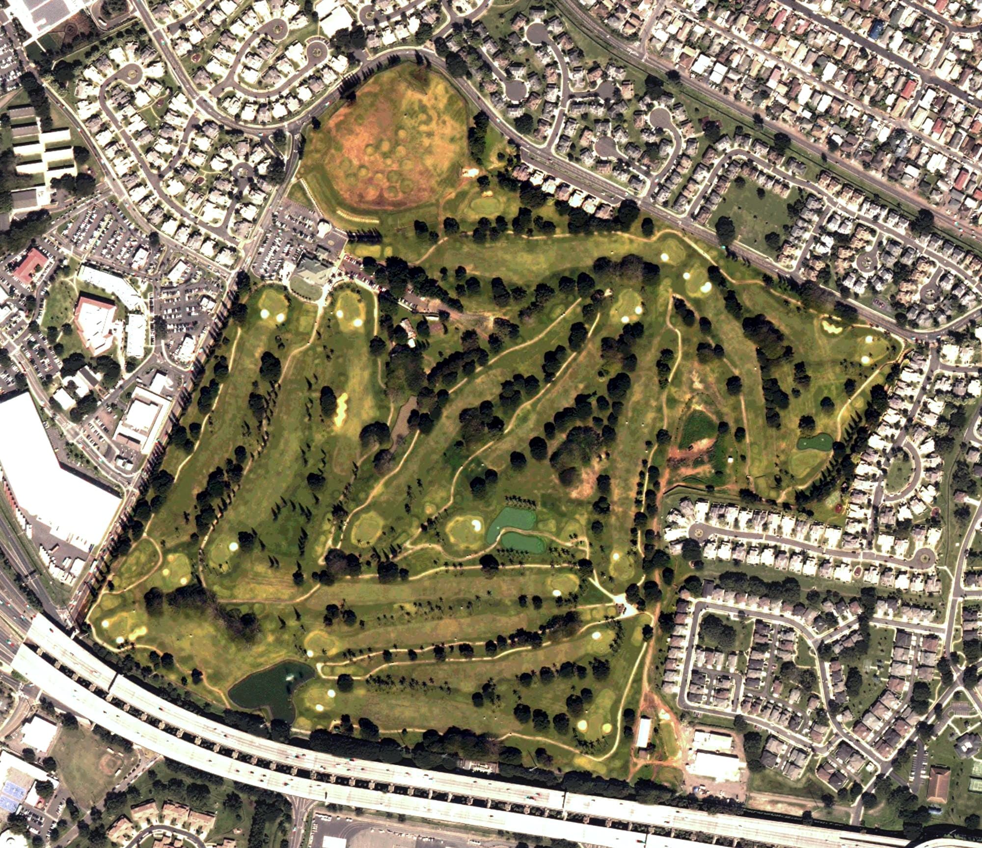 Aerial view of Navy Marine Golf Course, HI, with its hole routing marked