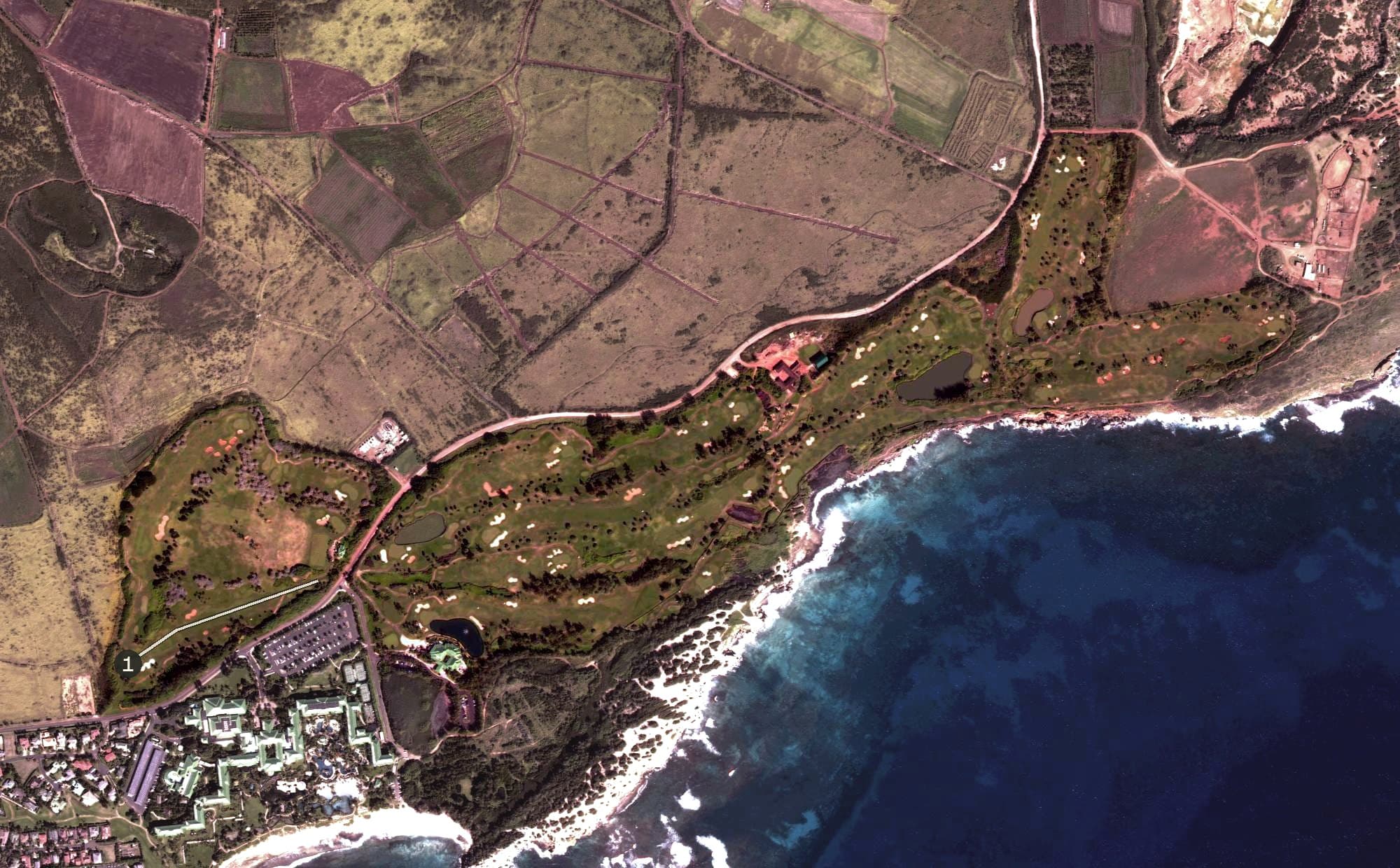 Aerial view of Poipu Bay Golf Course, HI, with its hole routing marked