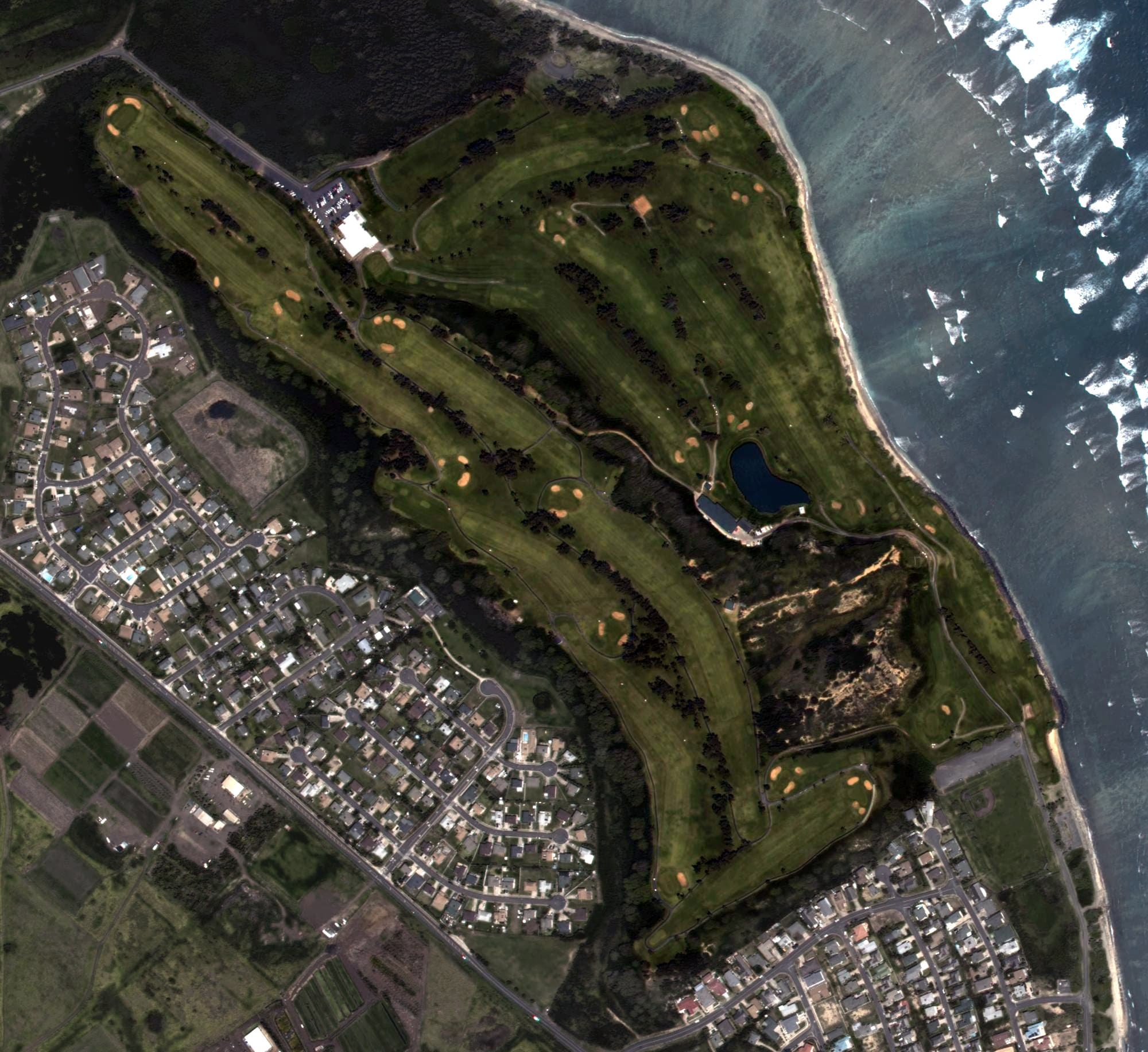 Aerial view of Waiehu Golf Course, HI, with its hole routing marked