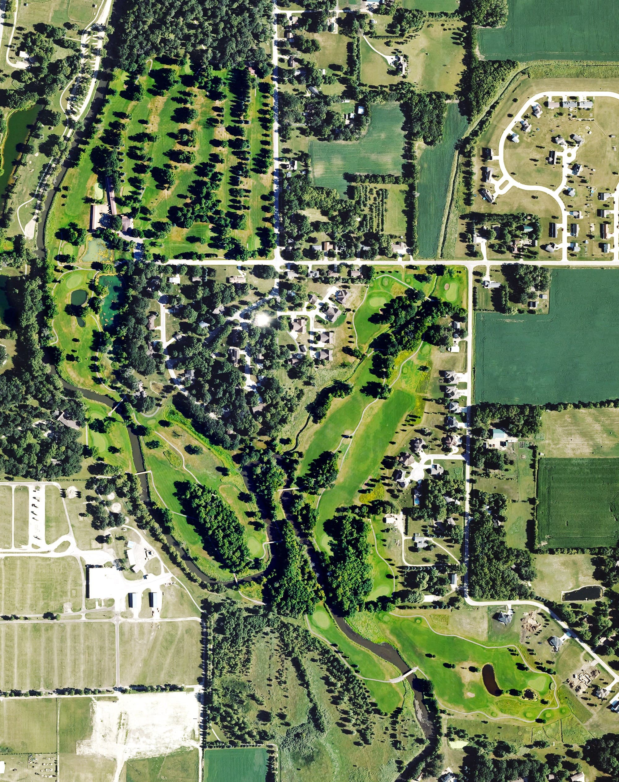Aerial view of Bear Creek Golf Course, IA, with its hole routing marked