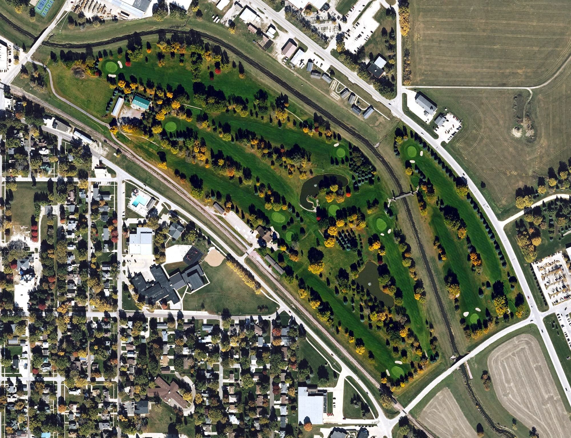 Aerial view of Ida Grove Golf and Country Club, IA, with its hole routing marked